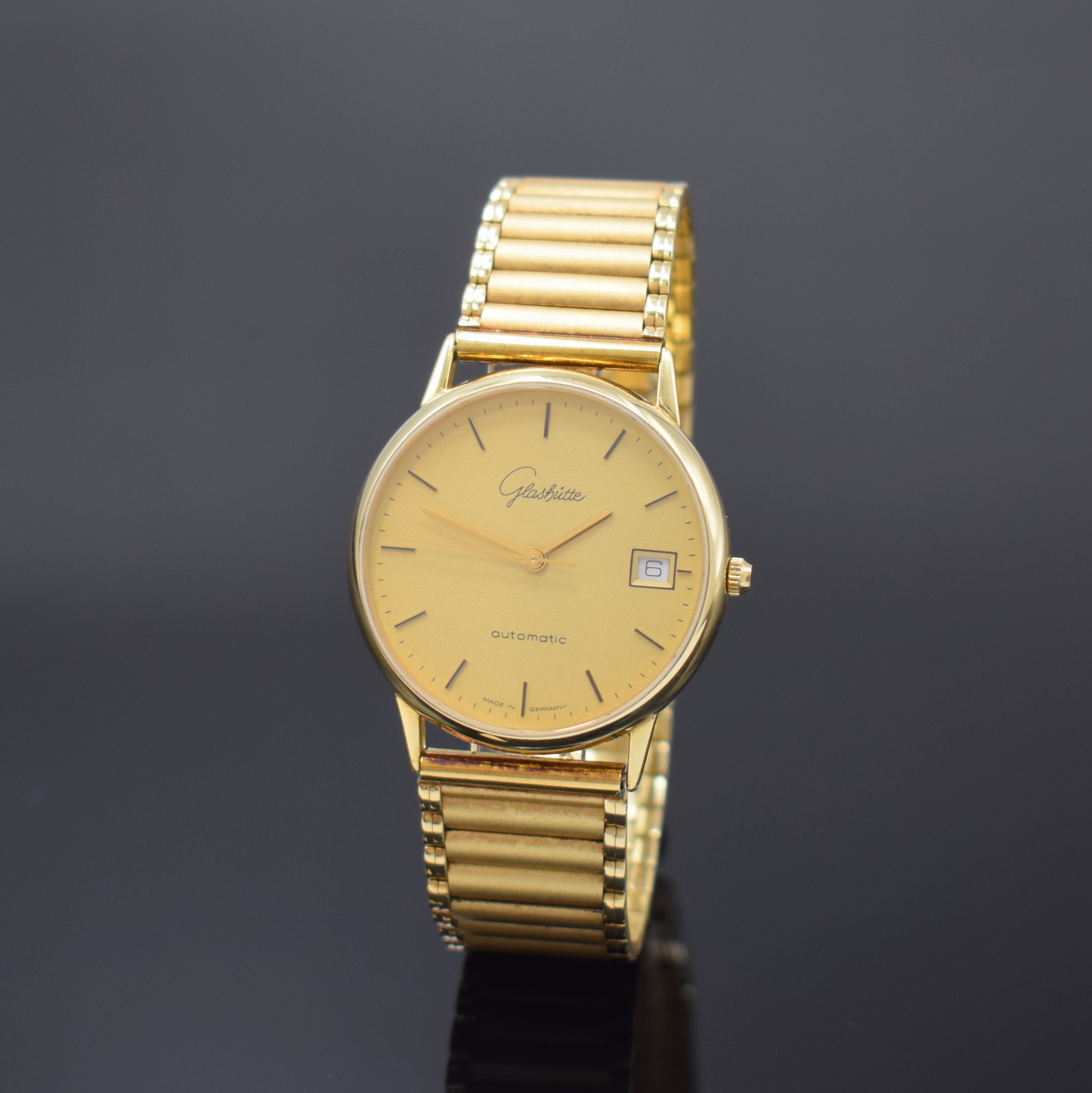 GLASHÜTTE seltene, auf 550 Stück limitierte Herrenarmbanduhr in GG 585/000, Deutschland um 1990, Automatik, neutr. Goldband, Boden aufgedr., ...