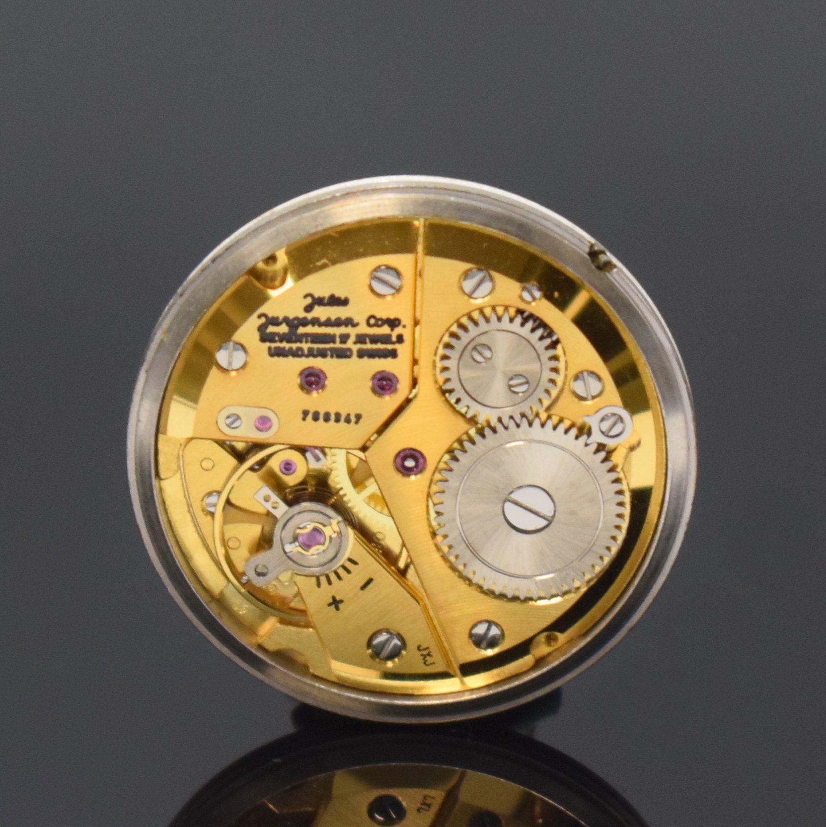 Detail e: JULES JÜRGENSEN Armbanduhr in WG 585/000, Schweiz/USA um 1965, Handaufzug, Einschalengeh., silb. Zifferbl. m. Diamant u. Strich-Ind., silb. Zeiger, ...