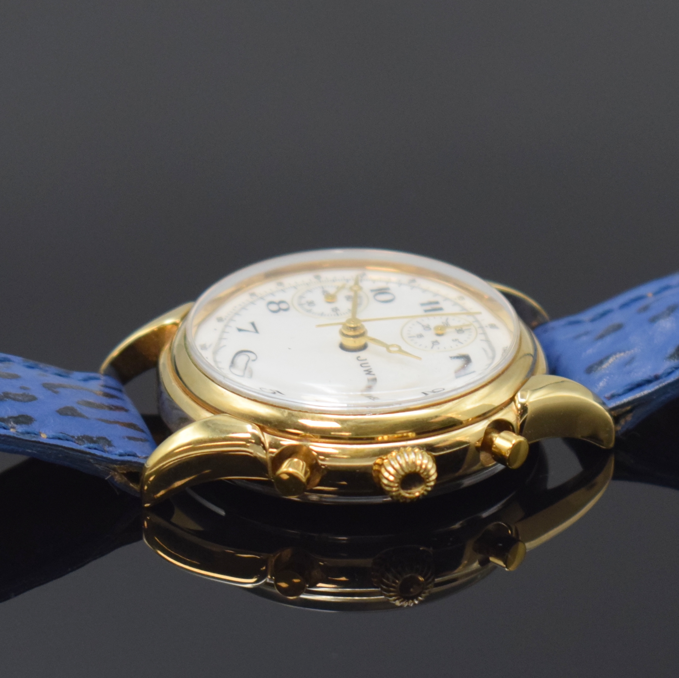 Detail b: JUWEL vergoldeter Herrenchronograph, Schweiz um 1990, Handaufzug, Stahlboden aufgedr., weißes Zifferbl. m. arab. Zahlen, gold. Zeiger, ...