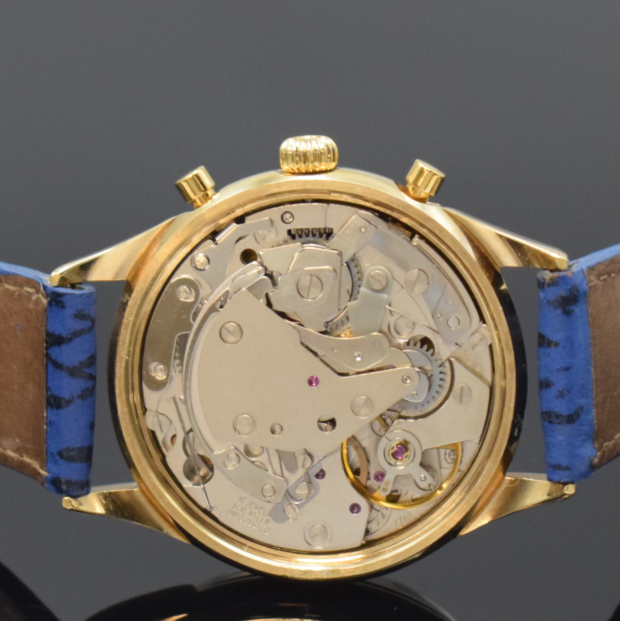 Detail d: JUWEL vergoldeter Herrenchronograph, Schweiz um 1990, Handaufzug, Stahlboden aufgedr., weißes Zifferbl. m. arab. Zahlen, gold. Zeiger, ...