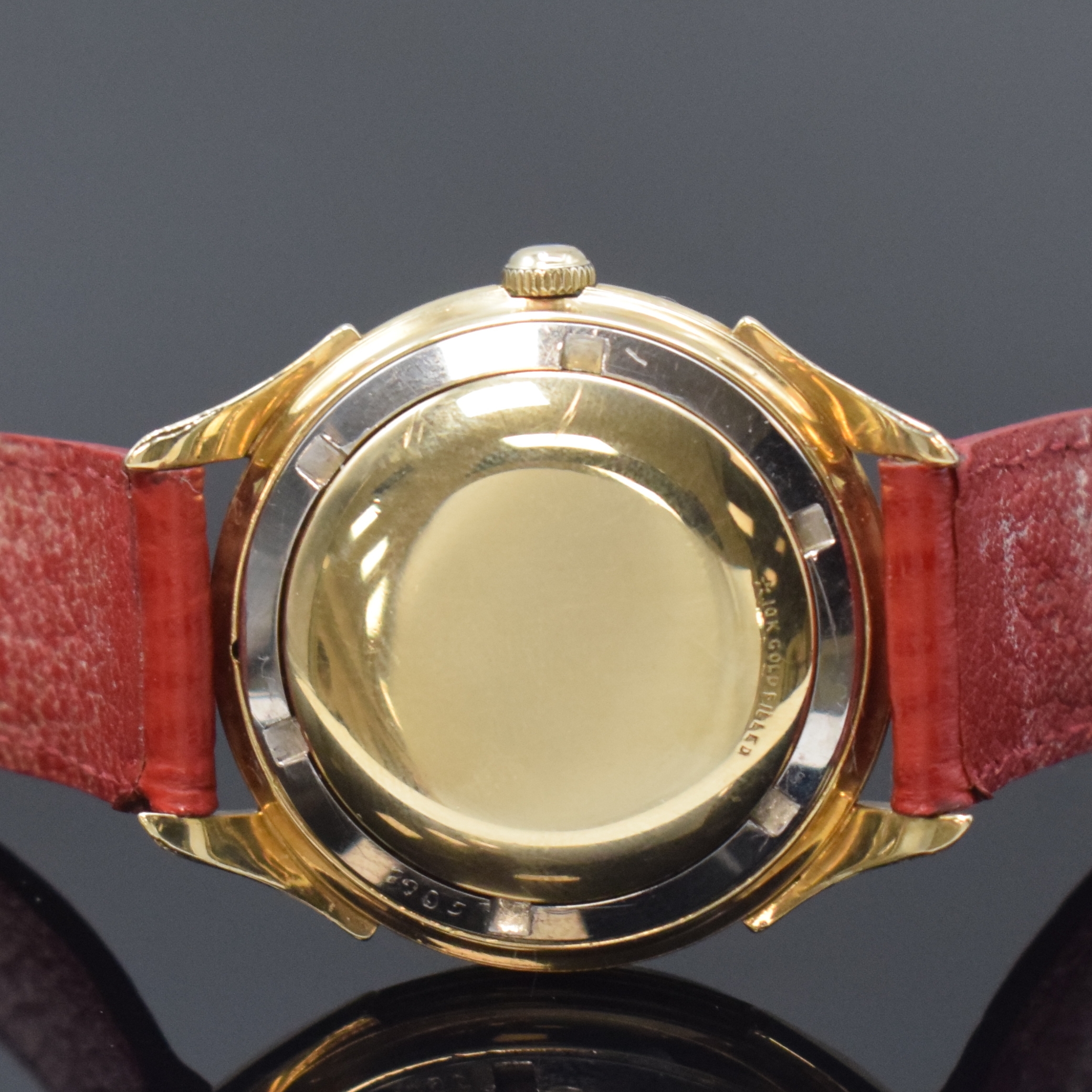 Detail c: LONGINES 10k Gold Filled Herrenarmbanduhr, Schweiz um 1955, Automatik, Boden verschr., silb. Zifferbl. m. Strahlendekor, gold. Std.- Ind., gold. ...