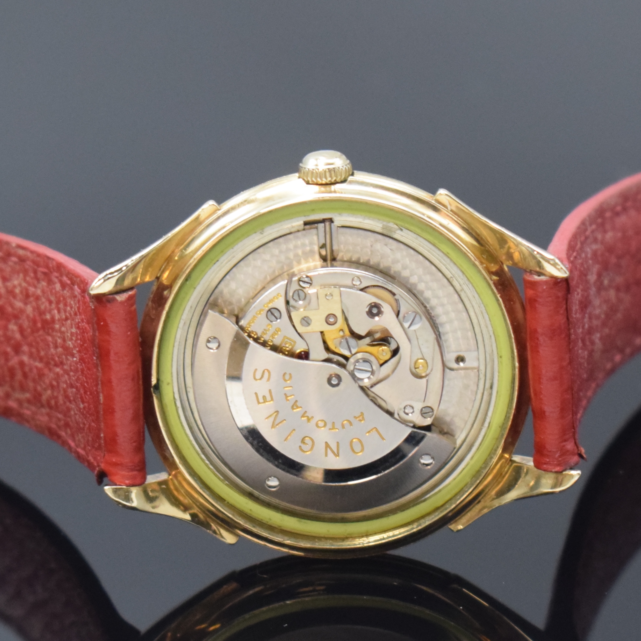 Detail d: LONGINES 10k Gold Filled Herrenarmbanduhr, Schweiz um 1955, Automatik, Boden verschr., silb. Zifferbl. m. Strahlendekor, gold. Std.- Ind., gold. ...