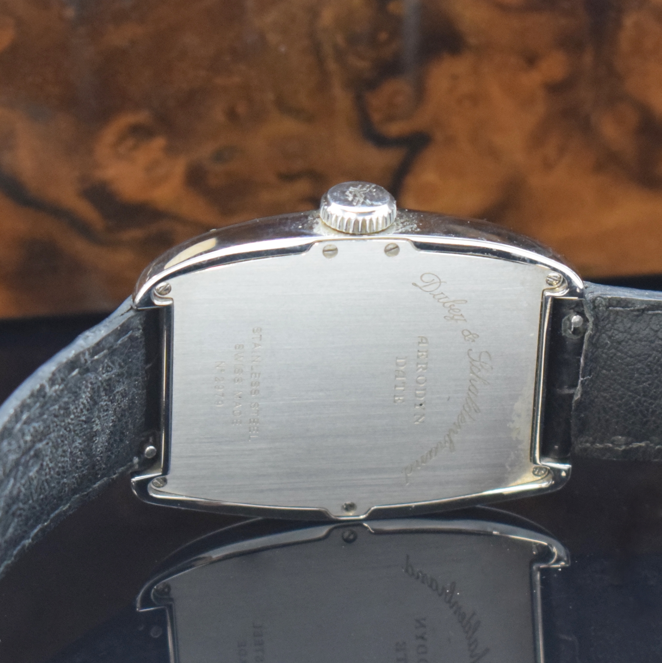 Detail d: DUBEY & SCHALDENBRAND Aerodyn Date Herrenarmbanduhr in Stahl, Schweiz um 2000, Automatik, Boden 7-fach verschr., orig. Lederband m. Faltschl., ...