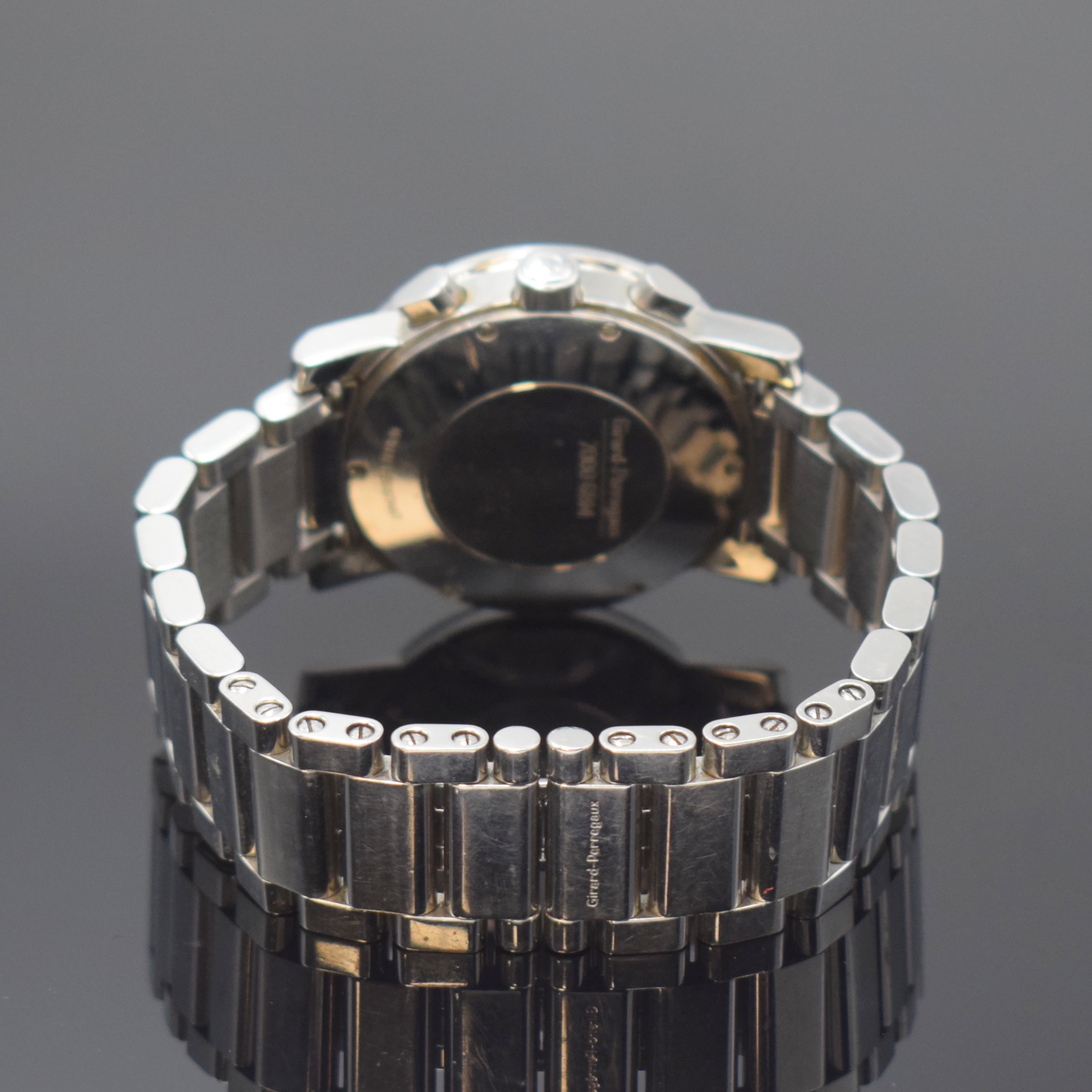 Detail b: GIRARD PERREGAUX Herrenarmbanduhr mit Chronograph Referenz 7000 GBM, Automatik, Schweiz um 1995, Edelstahlgeh. m. 6-fach verschr. Boden, orig. ...