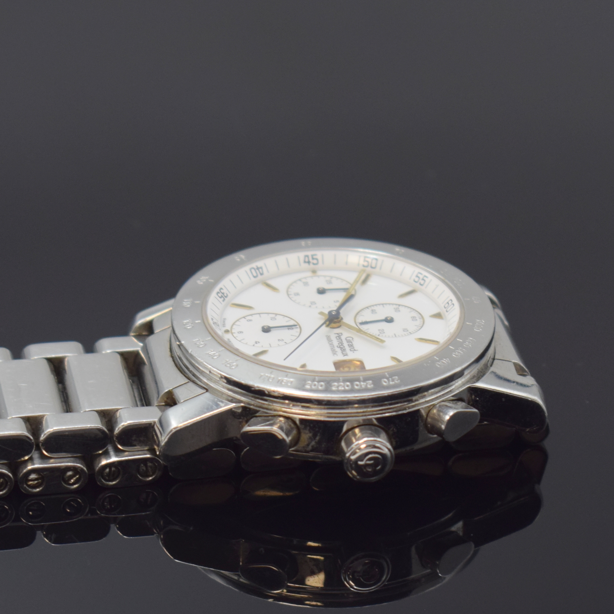 Detail c: GIRARD PERREGAUX Herrenarmbanduhr mit Chronograph Referenz 7000 GBM, Automatik, Schweiz um 1995, Edelstahlgeh. m. 6-fach verschr. Boden, orig. ...