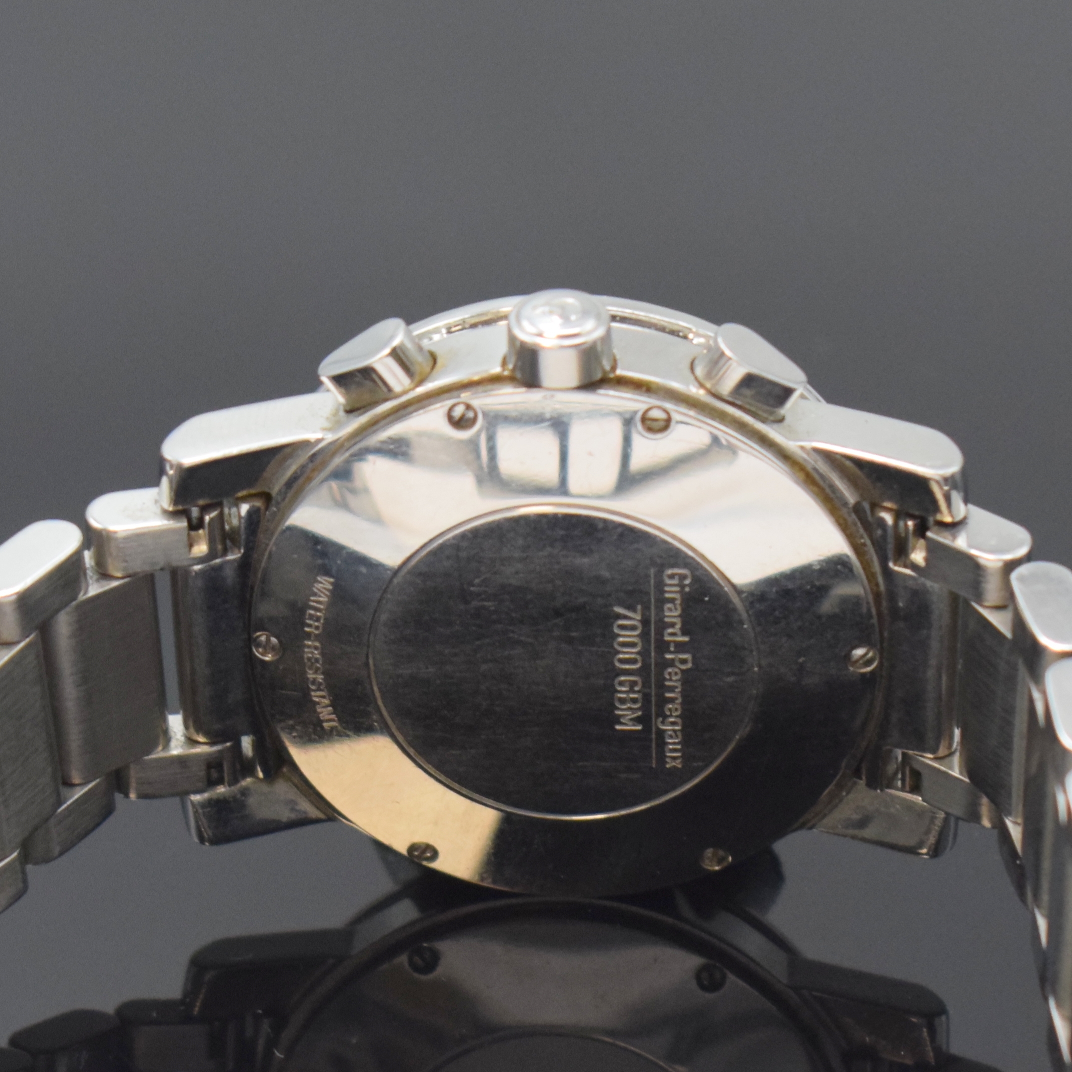 Detail d: GIRARD PERREGAUX Herrenarmbanduhr mit Chronograph Referenz 7000 GBM, Automatik, Schweiz um 1995, Edelstahlgeh. m. 6-fach verschr. Boden, orig. ...