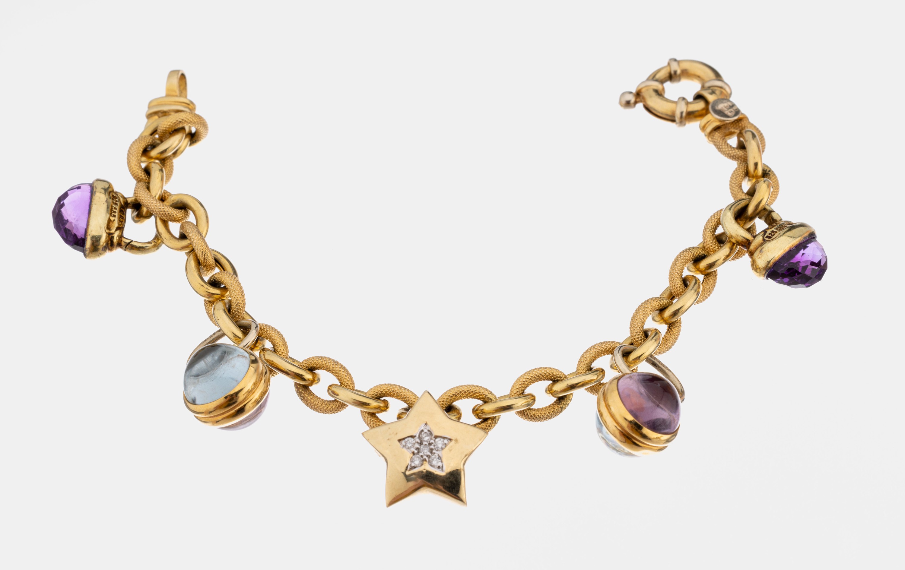 14 kt Gold Farbstein-Brillant-Armband, GG 585/000, 5 bewegl. Abhängungen, 2 x facett. Amethyste zus. ca. 5.0 ct, 2 Aquamarin- Cabochons zus. ca. ...
