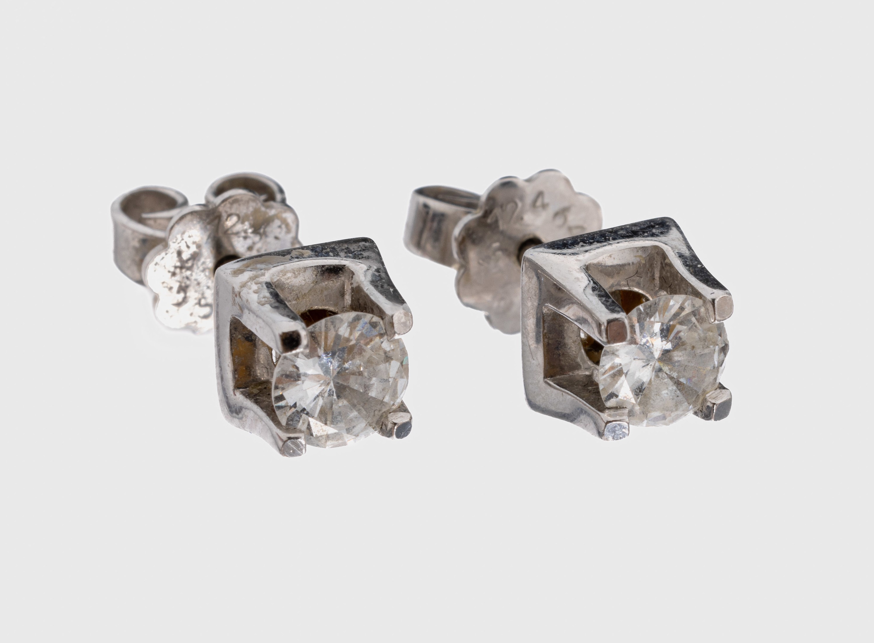 Paar 14 kt Gold Brillant-Ohrstecker, WG 585/000, 2 Brillanten zus. ca. 0.80 ct Weiß/si, ca. 2.5 g