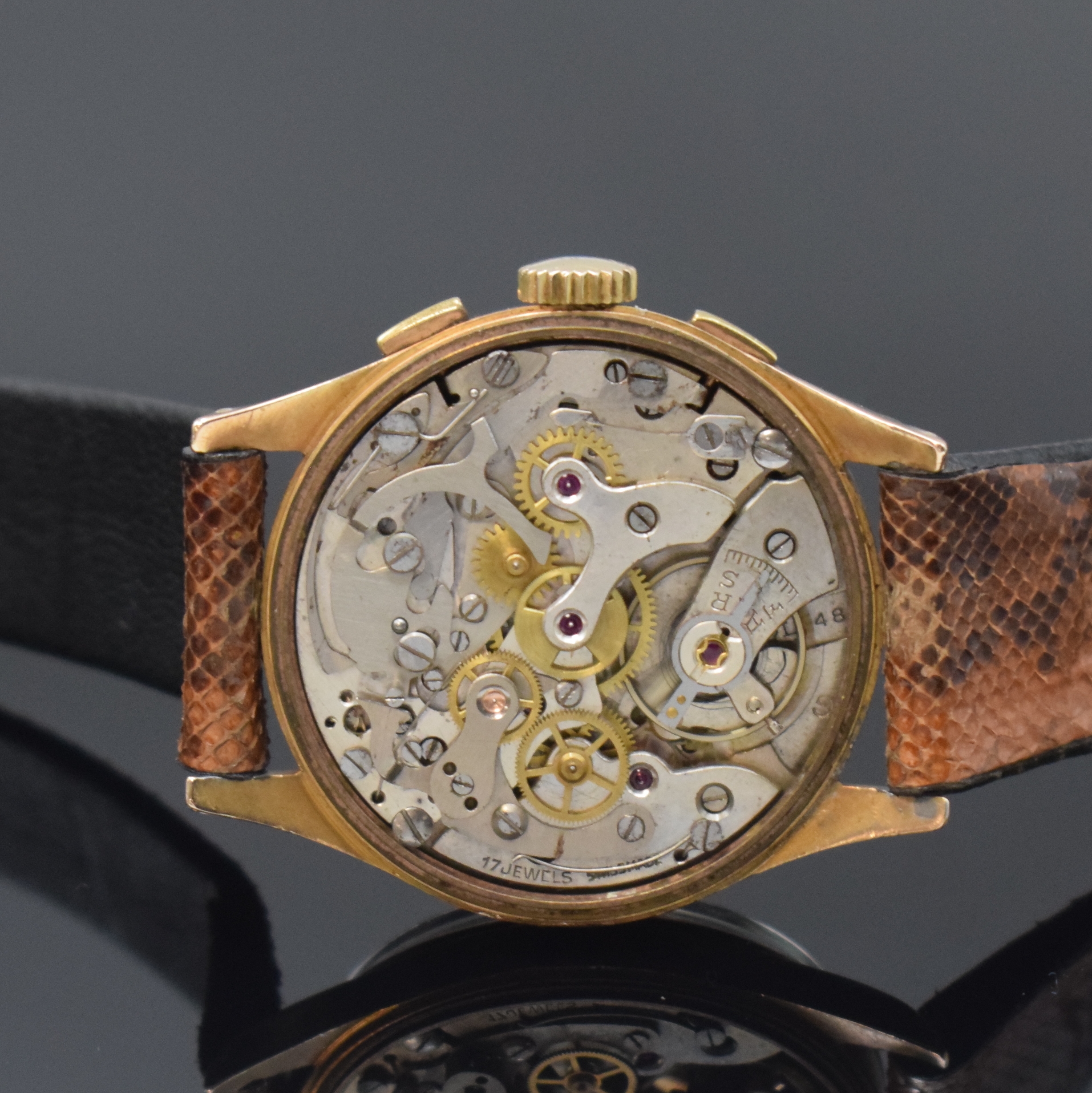 Detail e: LANDERON Armbandchronograph in RG 750/000, Schweiz um 1955, Handaufzug, Boden u. Glasrand aufgedr., Geh. dell., silb. Zifferbl. bez. Chronographe ...
