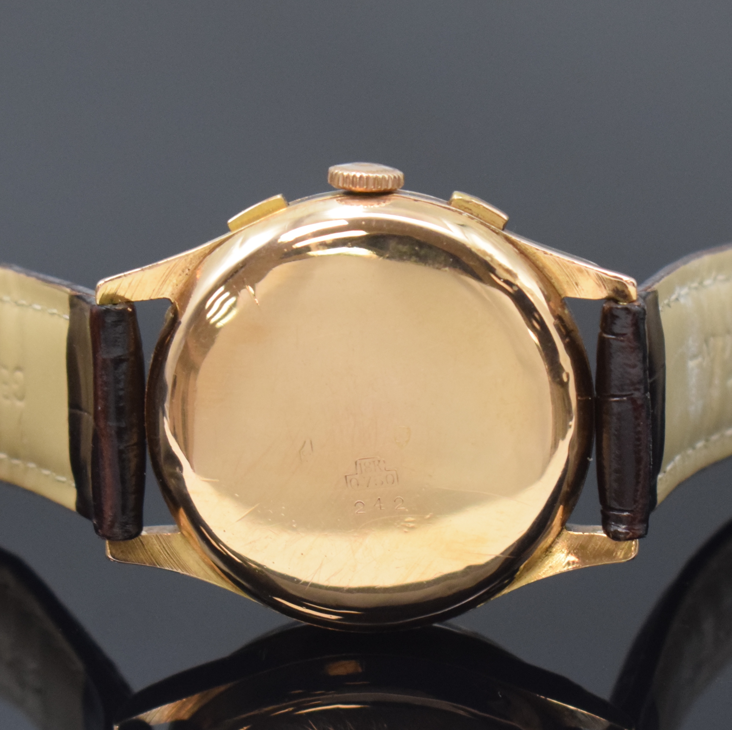 Detail d: TITUS Herrenarmbanduhr mit Chronograph in RG 750/000, Schweiz um 1950, Handaufzug, 3- teil. Geh. dell., Boden und Glasrand aufgedr., verg. Cuv., ...