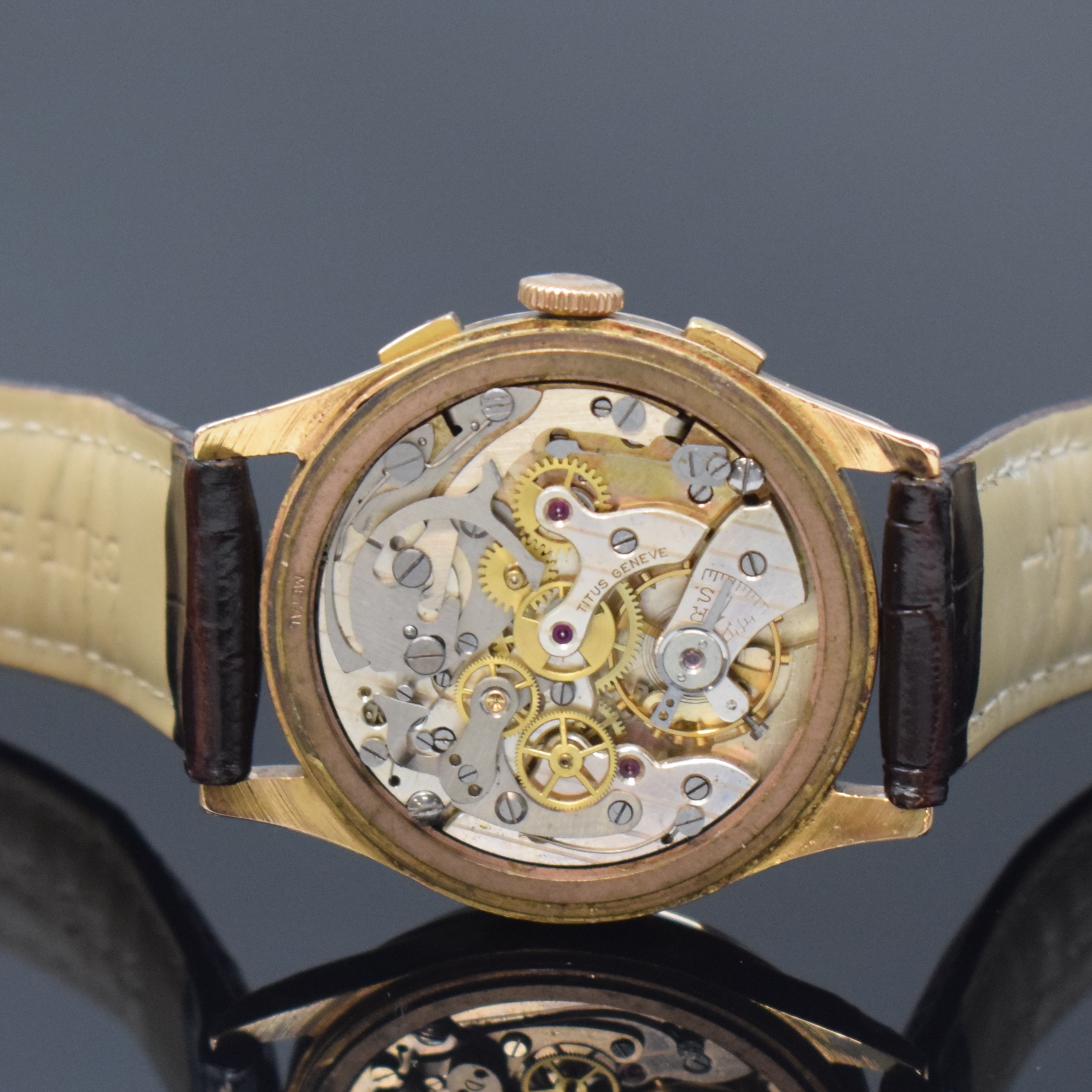 Detail f: TITUS Herrenarmbanduhr mit Chronograph in RG 750/000, Schweiz um 1950, Handaufzug, 3- teil. Geh. dell., Boden und Glasrand aufgedr., verg. Cuv., ...