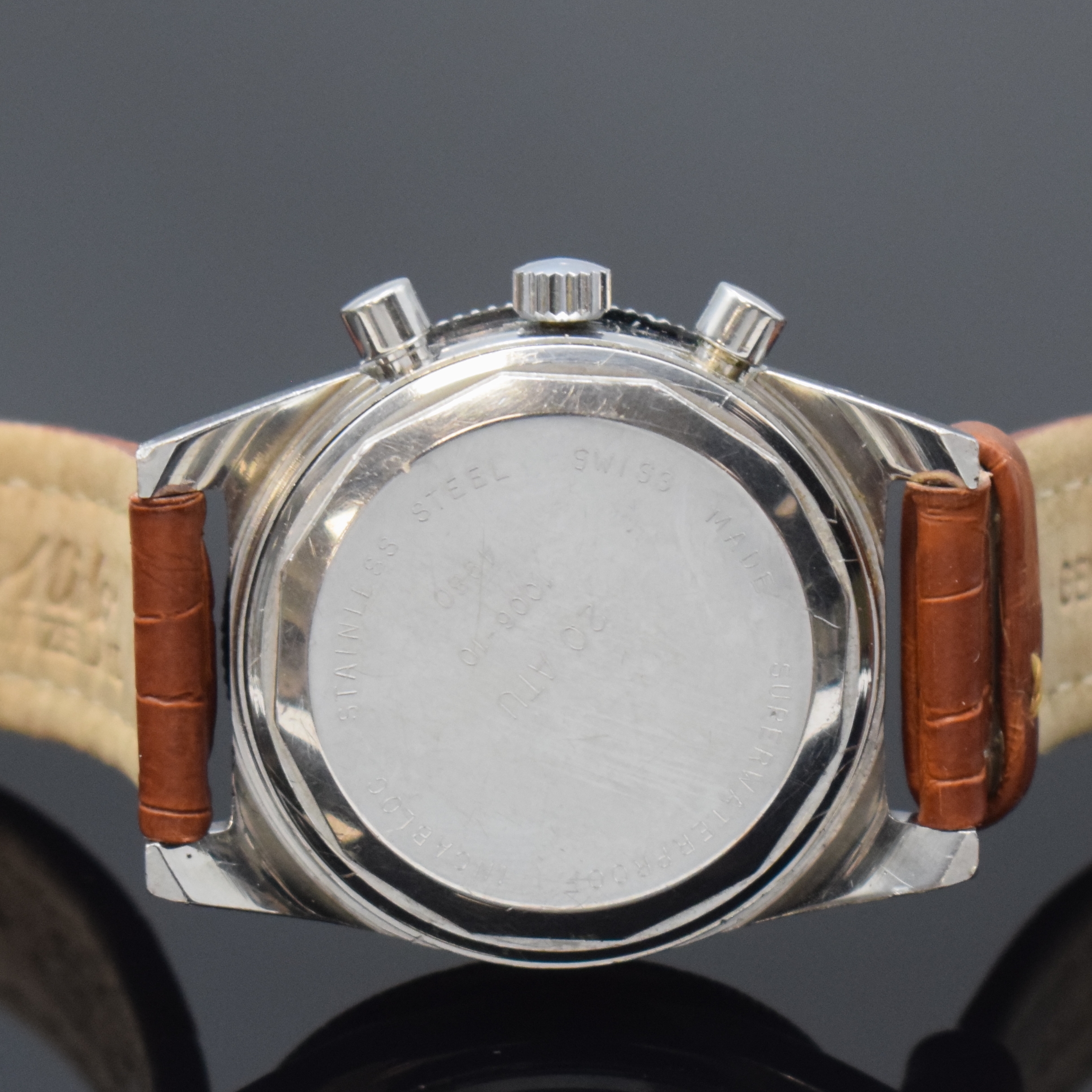 Detail d: Armbandchronograph in Edelstahl, Handaufzug, Schweiz um 1968, Boden verschr., Mido Lederband m. Mido Faltschl., silb. Zifferbl. m. aufges. Indizes ...