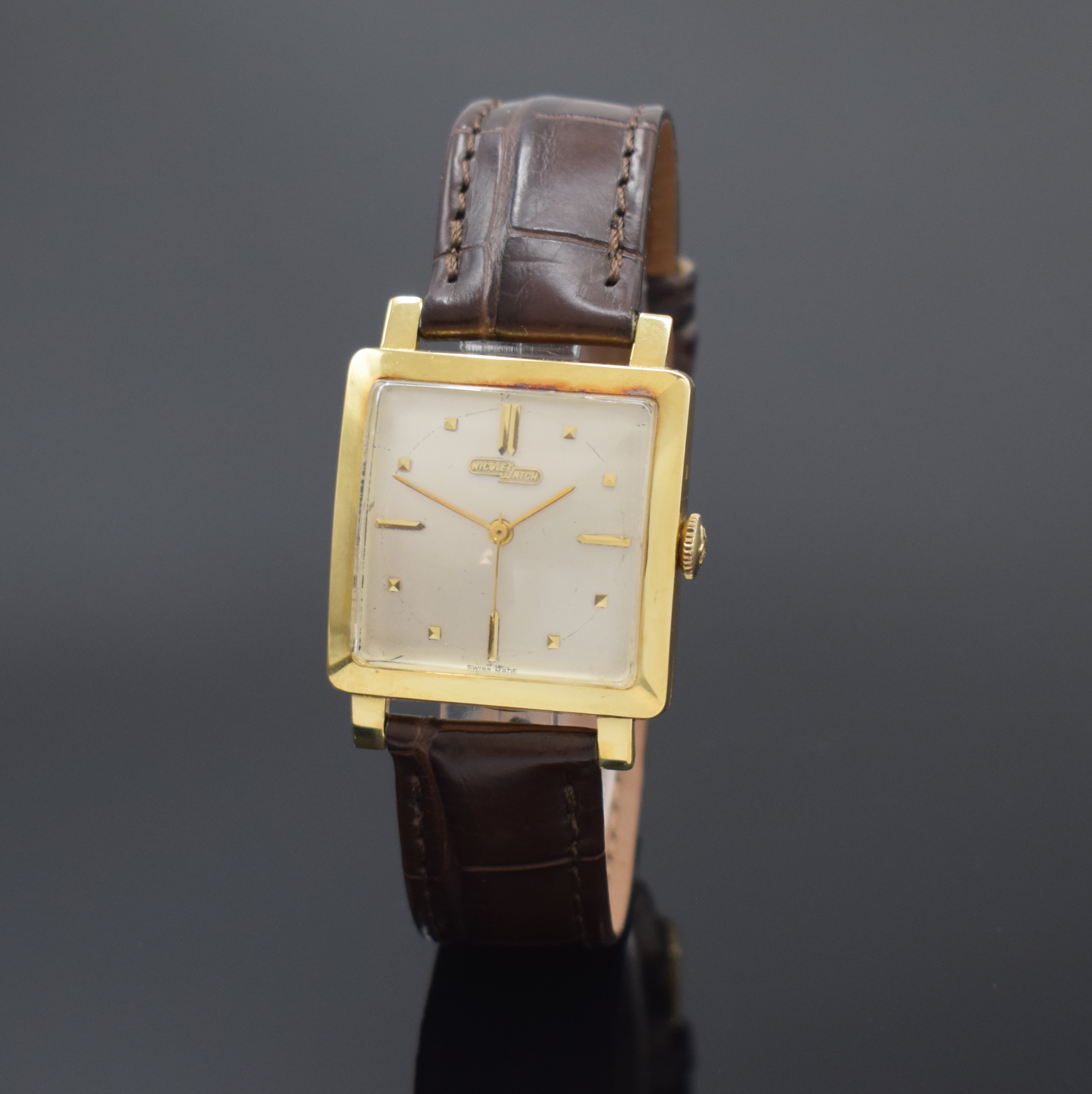 NICOLET Armbanduhr in GG 750/000, Automatik, Schweiz um 1957, 2-teil Geh., Boden aufgedr., silb. Zifferbl. m. aufgel. Indizes altersbed. fl., ...