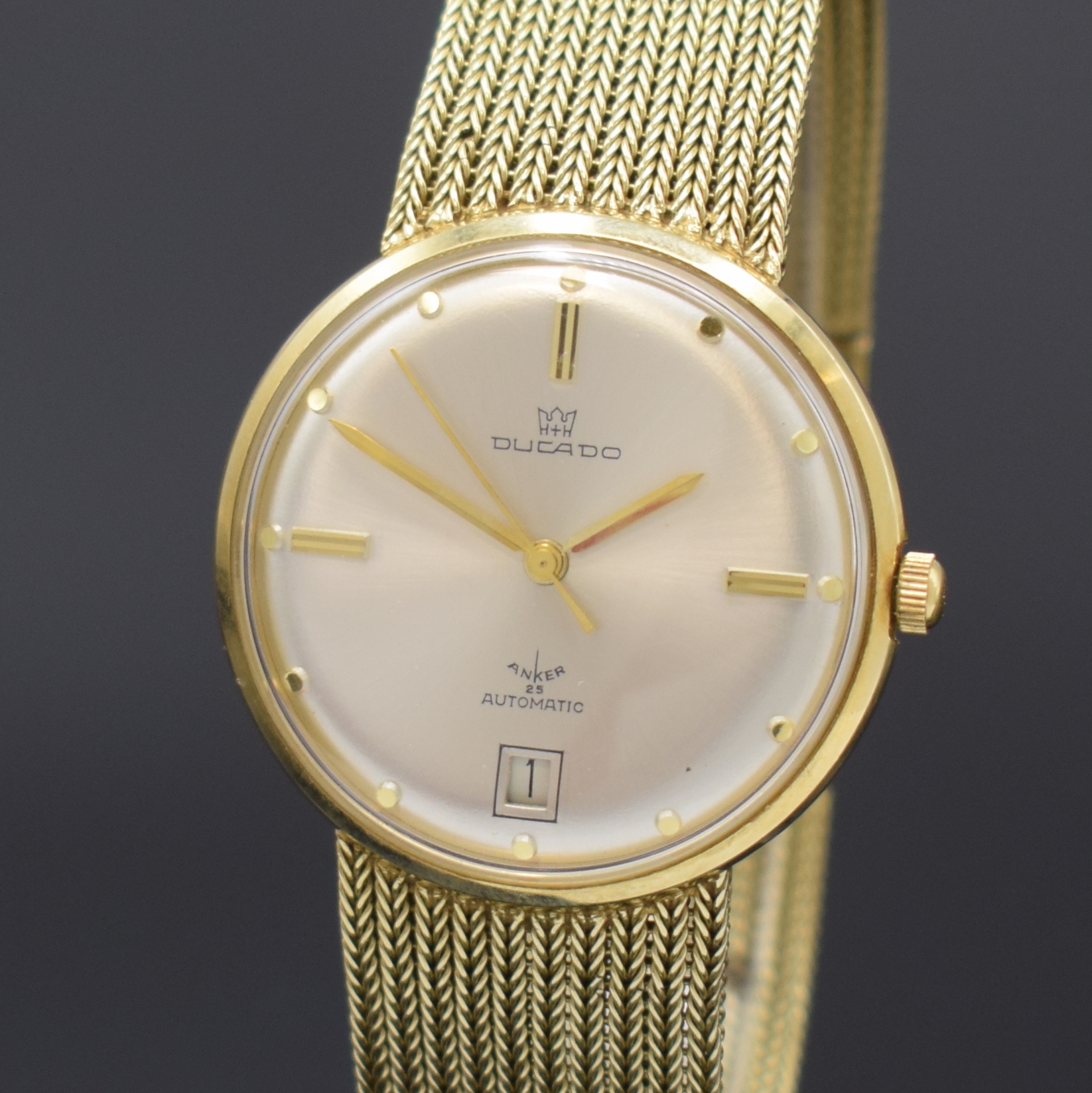 Detail a: DUCADO Armbanduhr in GG 585/000, Schweiz/Deutschland um 1965, Automatik, Boden aufgedr., silb. Zifferbl. m. gold. Std.-Ind., gold. Zeiger, Datum b. ...