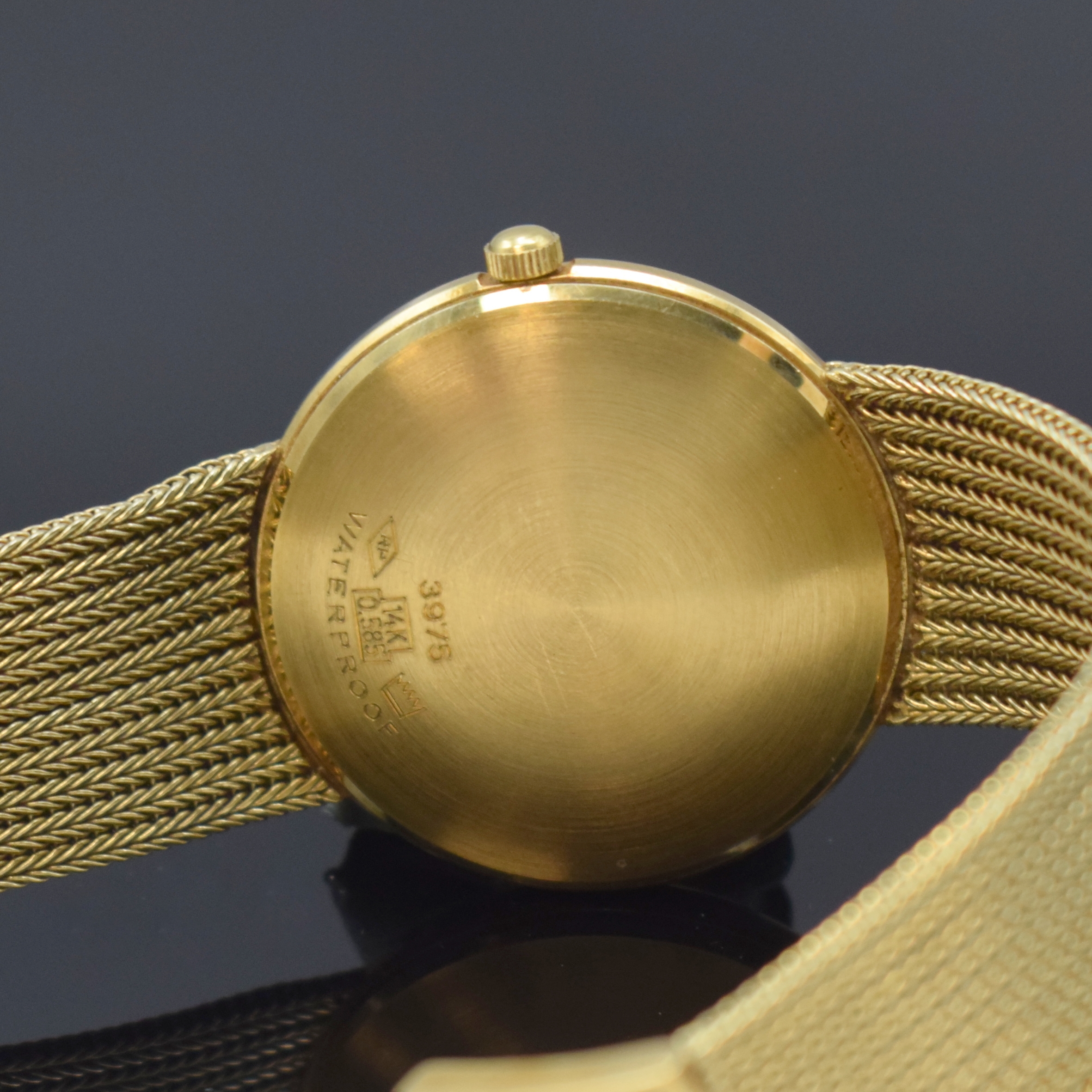 Detail d: DUCADO Armbanduhr in GG 585/000, Schweiz/Deutschland um 1965, Automatik, Boden aufgedr., silb. Zifferbl. m. gold. Std.-Ind., gold. Zeiger, Datum b. ...