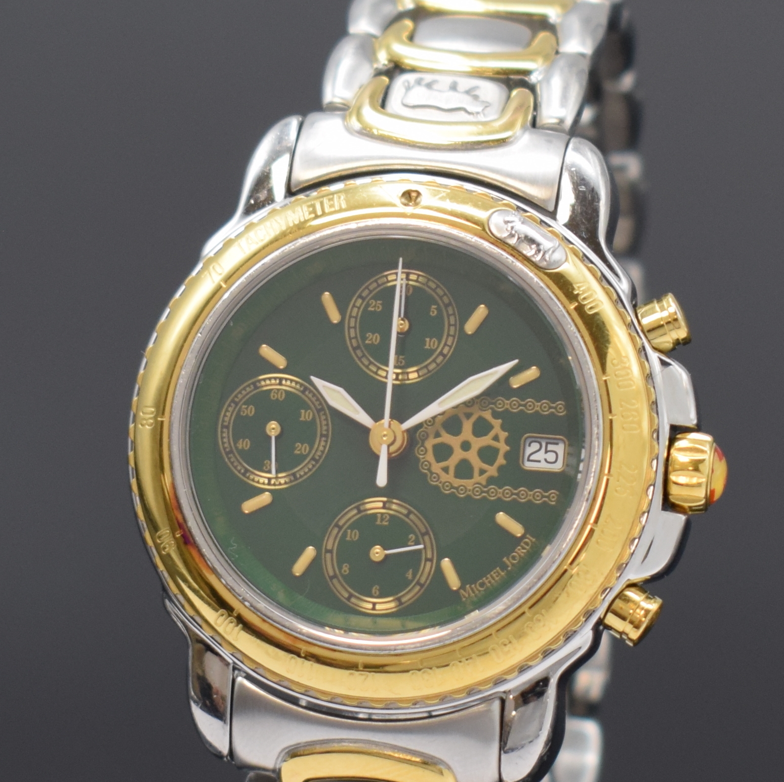 Detail a: MICHEL JORDI Armbandchronograph Ethno Chrono, Automatik, Schweiz um 1991, Edelstahl/Gold komb. inkl. Gliederband m. Faltschl., beids. vergl., Boden ...