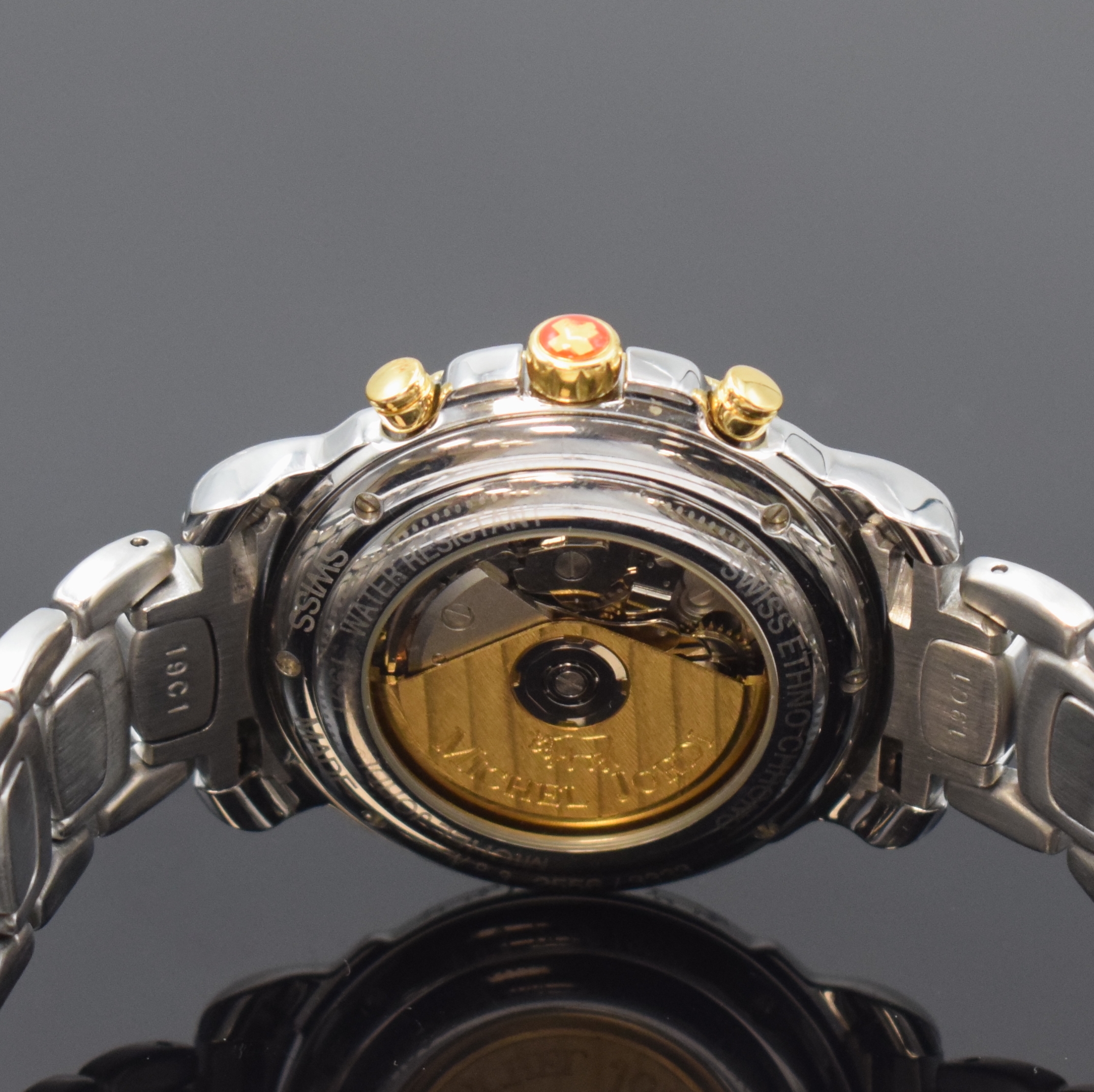 Detail d: MICHEL JORDI Armbandchronograph Ethno Chrono, Automatik, Schweiz um 1991, Edelstahl/Gold komb. inkl. Gliederband m. Faltschl., beids. vergl., Boden ...