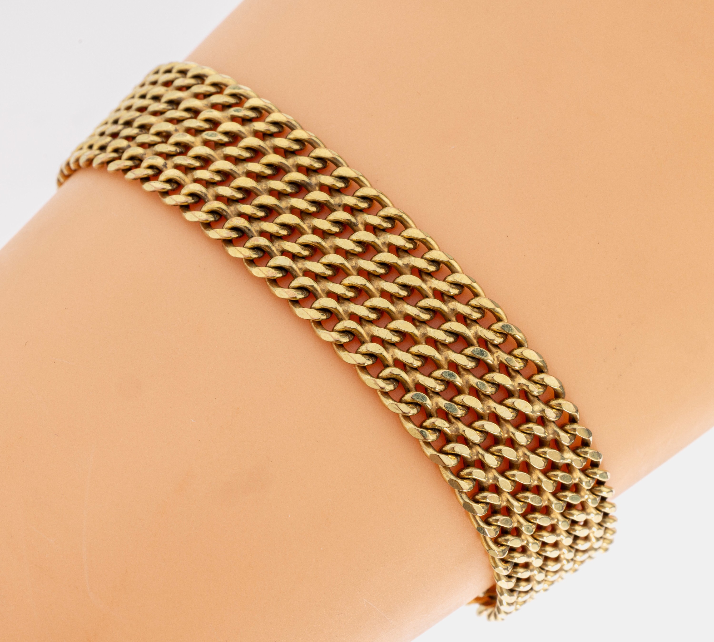 8 kt Gold Armband, GG 333/000, Flechtband, L. ca. 19 cm, Kastenschloss mit 2 Sicherheitsachten, ca. 28.3 g