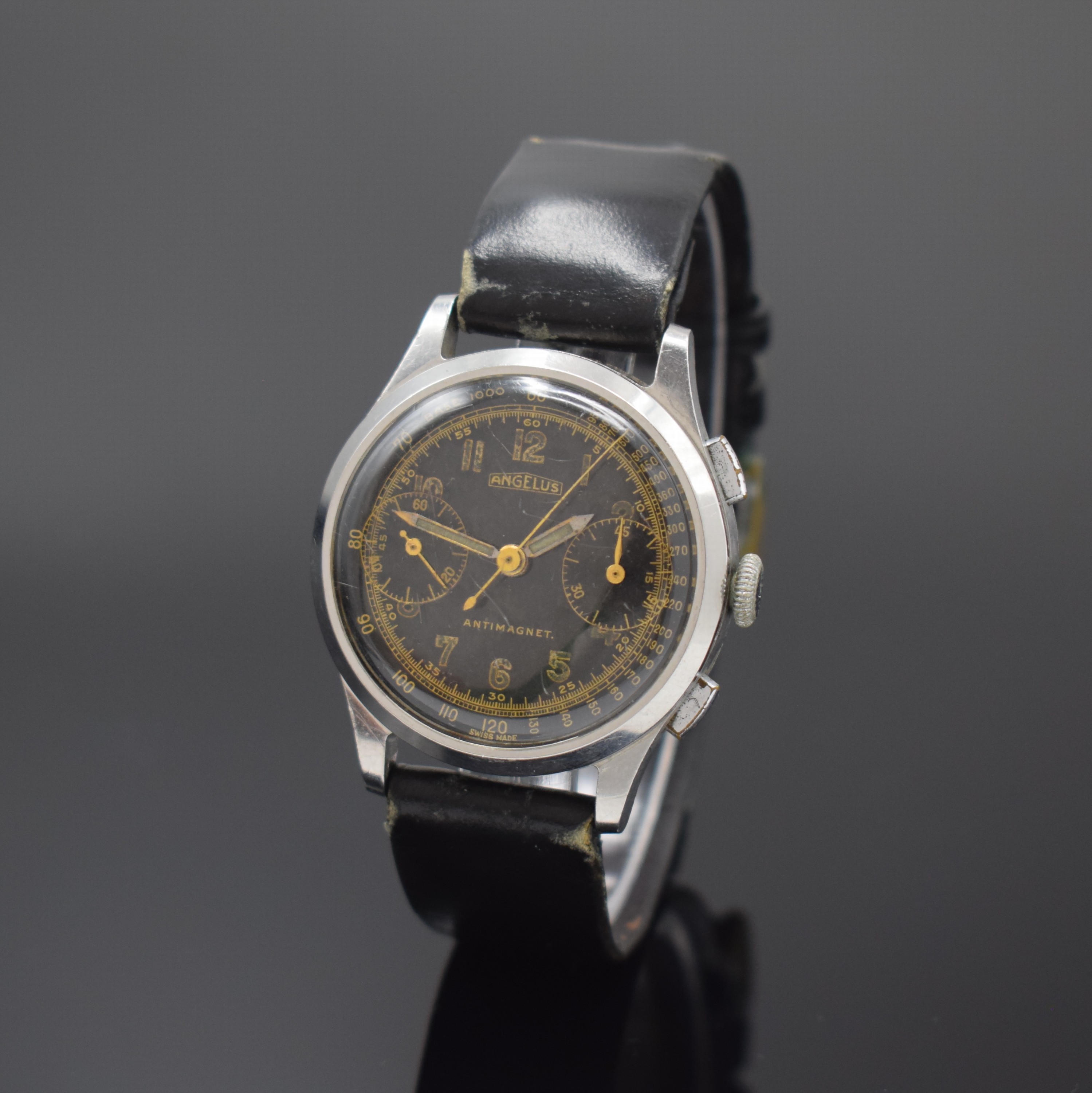 ANGELUS Herrenarmbanduhr mit Schaltradchronograph in Stahl, Schweiz um 1945, Handaufzug, Boden und Glasrand aufgedr., schwarzes originales ...