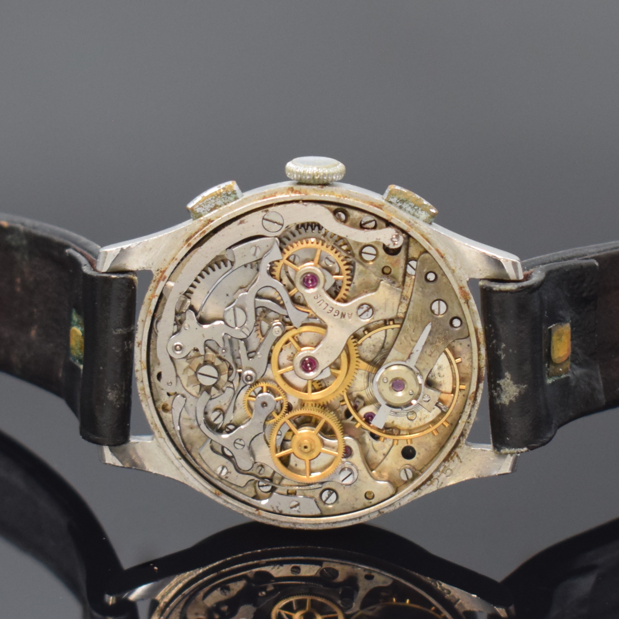 Detail f: ANGELUS Herrenarmbanduhr mit Schaltradchronograph in Stahl, Schweiz um 1945, Handaufzug, Boden und Glasrand aufgedr., schwarzes originales ...