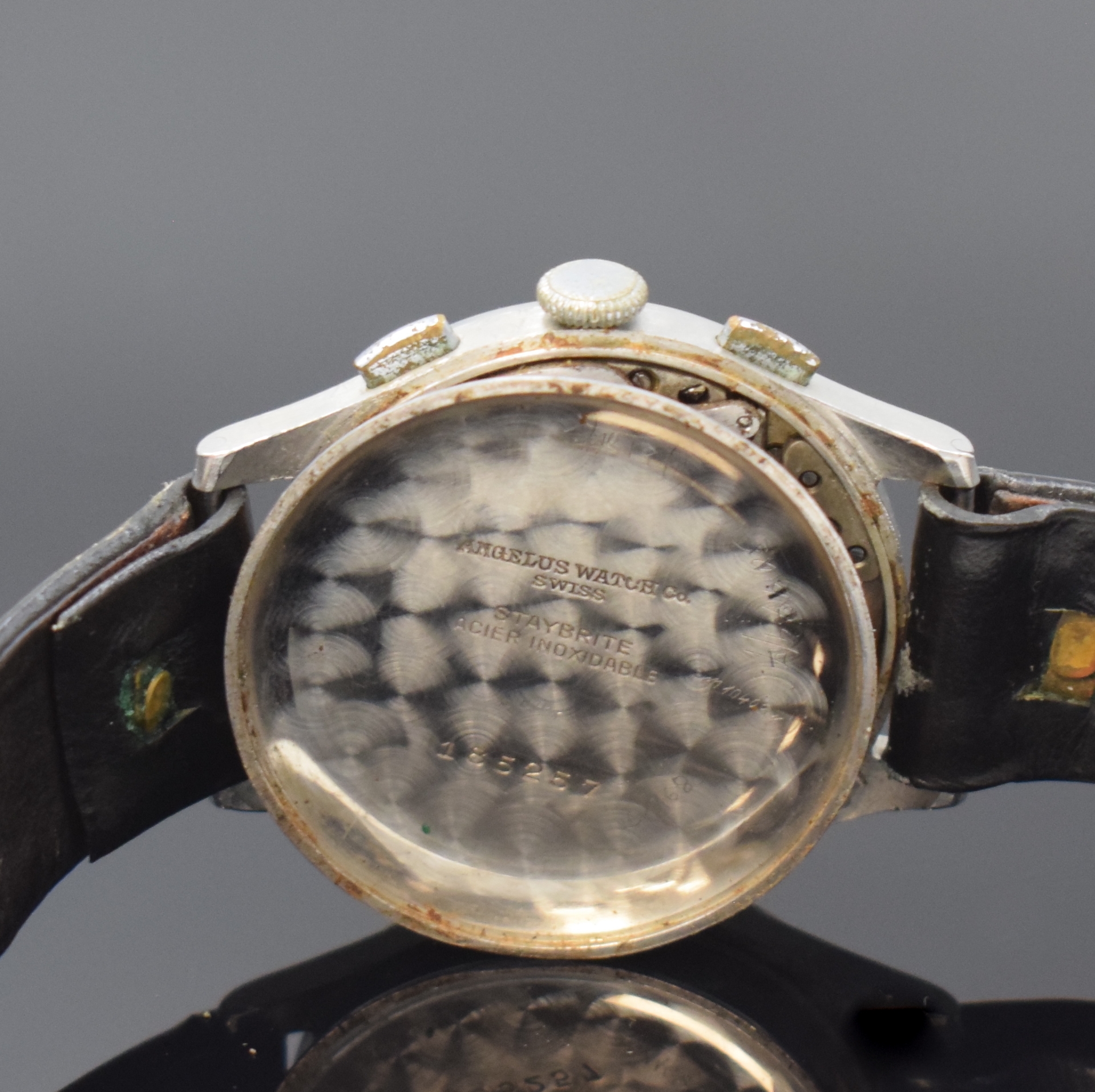 Detail g: ANGELUS Herrenarmbanduhr mit Schaltradchronograph in Stahl, Schweiz um 1945, Handaufzug, Boden und Glasrand aufgedr., schwarzes originales ...