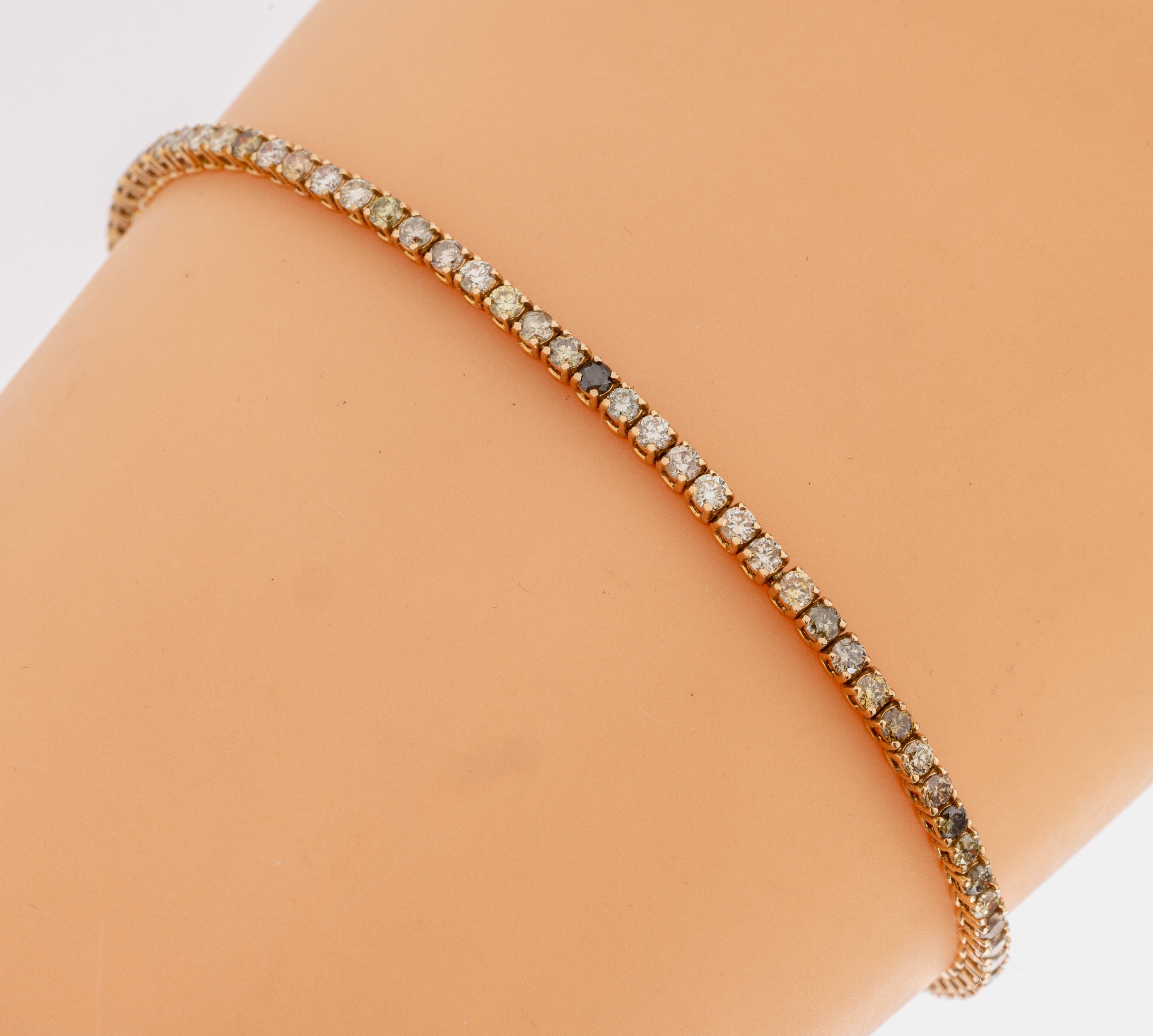 18 kt Gold Brillant-Armband, GG 750/000, 83Brillanten zus. ca. 2.60 ct natural fancy mix colors/vs-si und p1, ca. 6.09 g, L. ca. 18.5 cm, ...