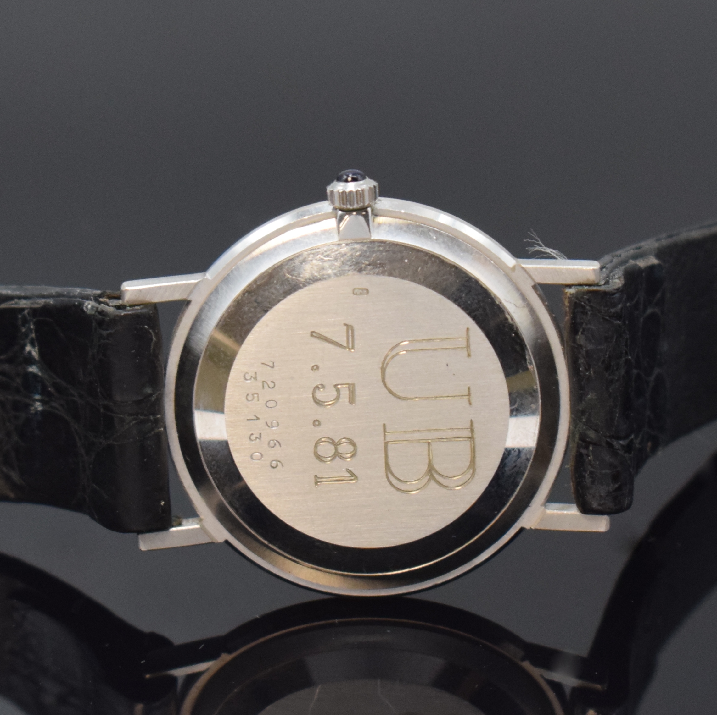 Detail c: BAUME & MERCIER Armbanduhr in WG 750/000 Referenz 35130, Handaufzug, Schweiz um 1990, 2-teil. Geh., Boden m. Eigentümergravur aufgedr., silb. ...