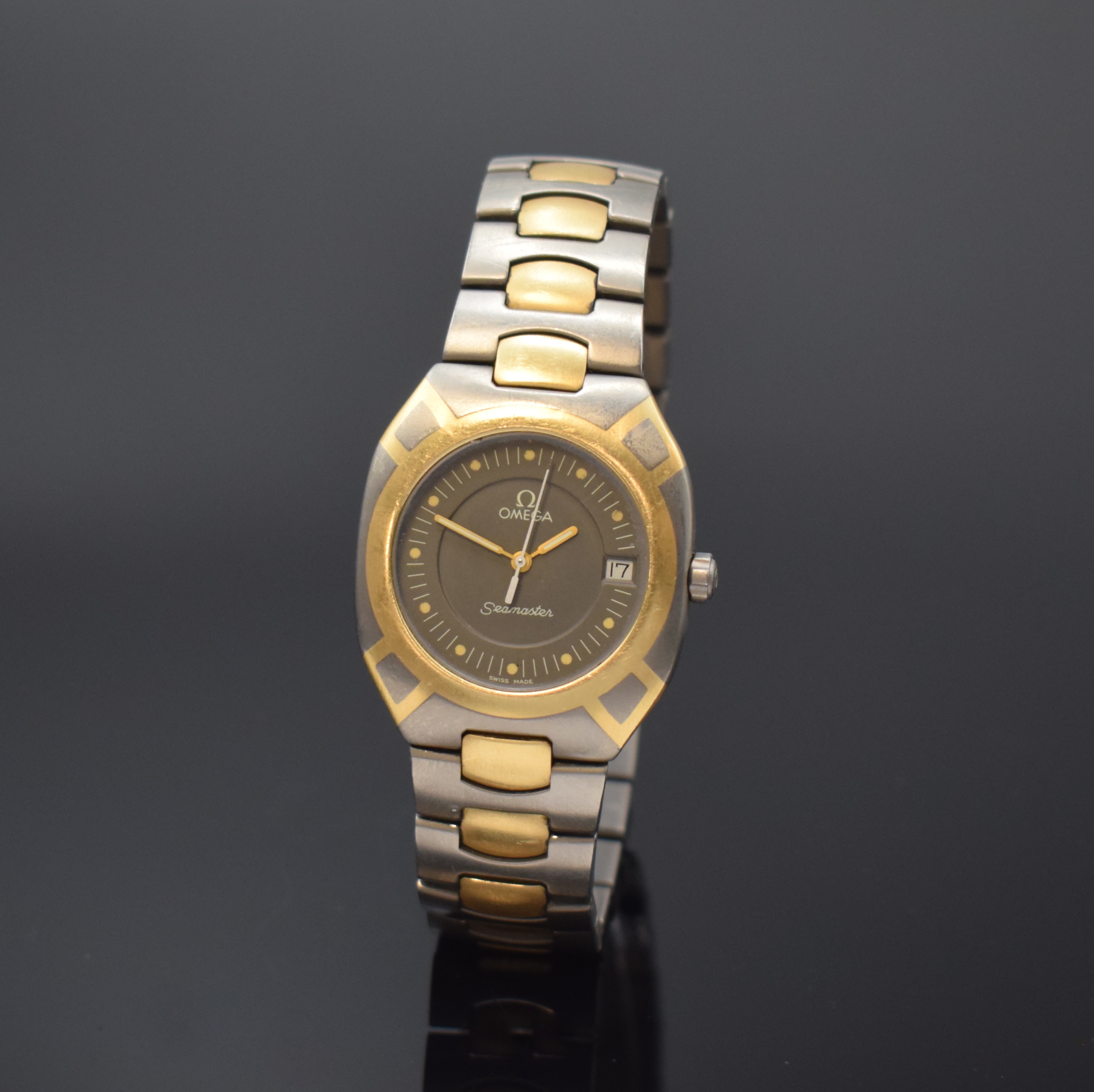 OMEGA Herrenarmbanduhr Seamaster Polaris Referenz 1960291/3960981, Schweiz um 1985, Titan/Gold kombiniert inkl. Gliederband m. Faltschl., Boden ...