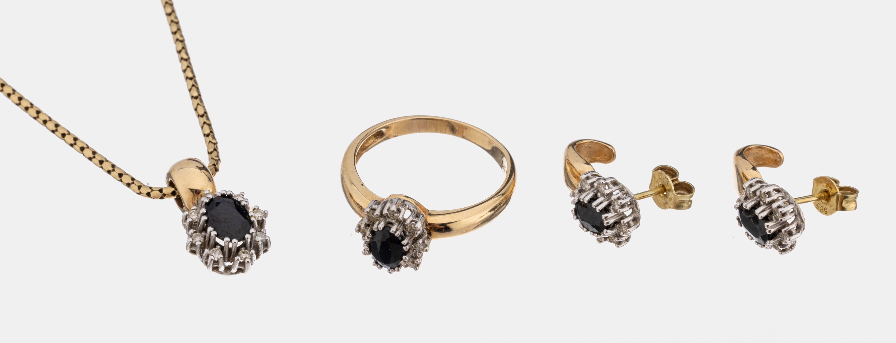 14 kt Gold Saphir-Diamant Schmuckset, GG/WG585/000, Collier mit ovalfacett. Saphir ca. 1 ct, umrahmt von 8 Diamanten zus. ca. 0.16 ...