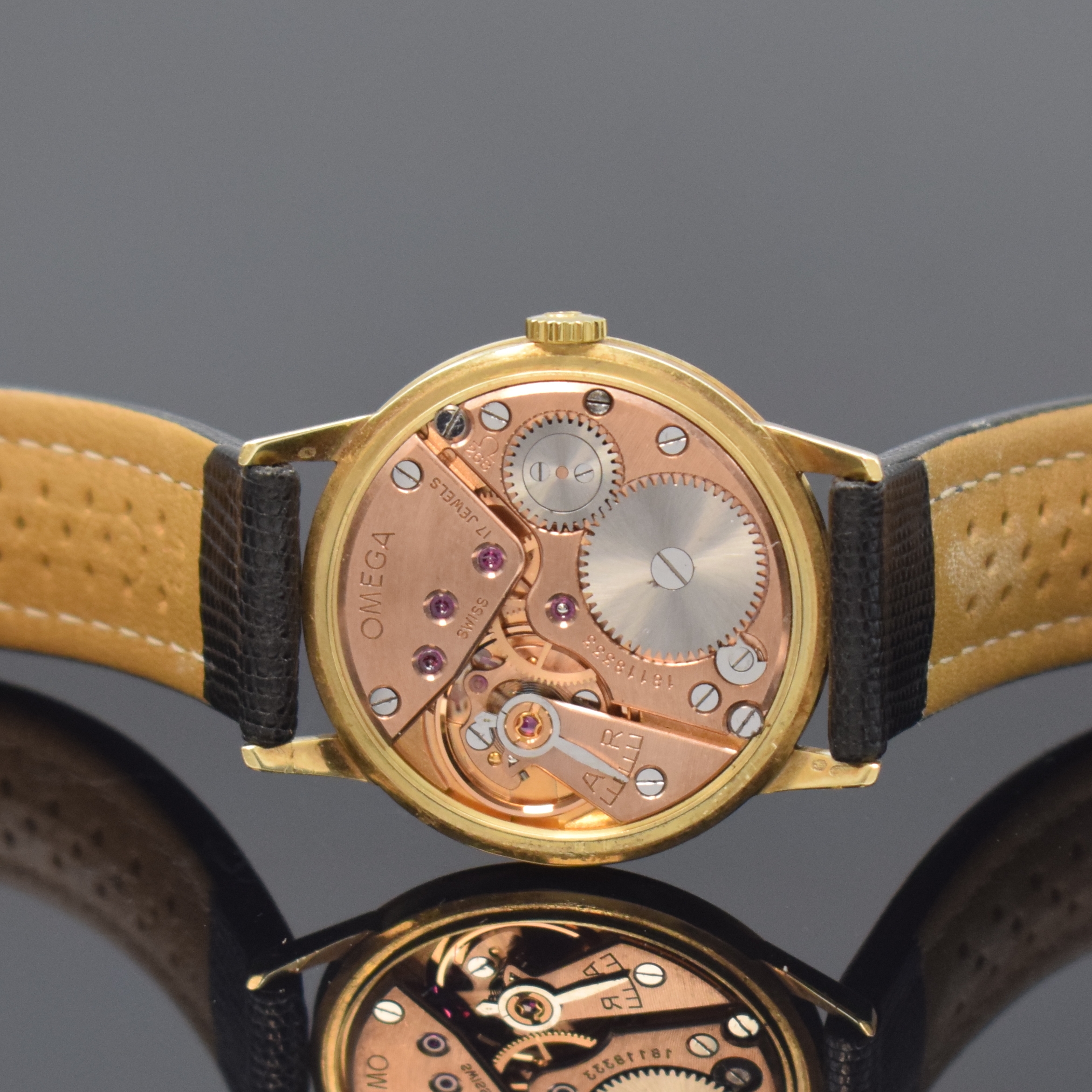 Detail d: OMEGA Armbanduhr in GG 585/000 Referenz 14715 3, Schweiz um 1962, Handaufzug, Boden aufgedr., silb. Zifferbl. m. gold. Std.-Ind., gold. Zeiger, kl. ...