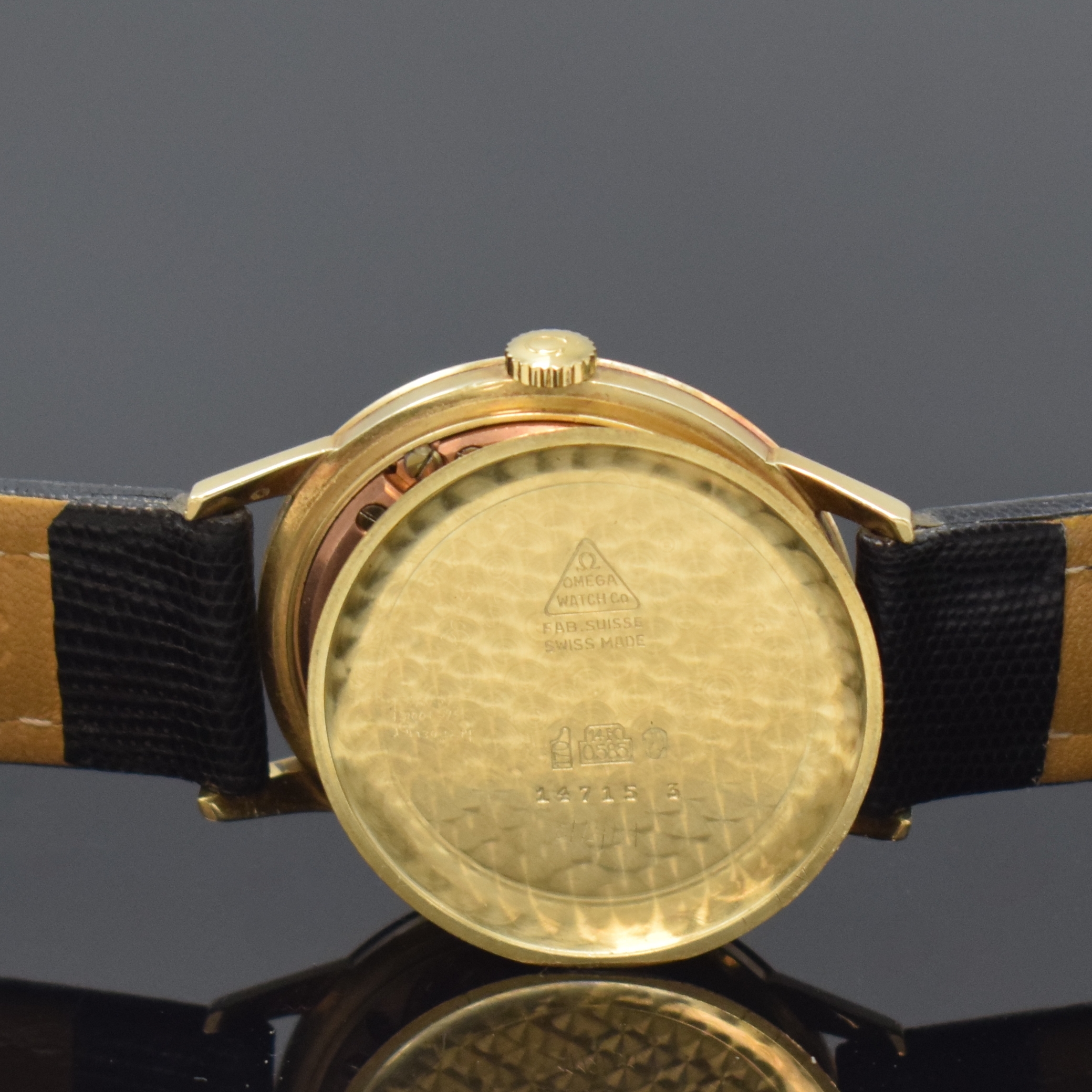 Detail e: OMEGA Armbanduhr in GG 585/000 Referenz 14715 3, Schweiz um 1962, Handaufzug, Boden aufgedr., silb. Zifferbl. m. gold. Std.-Ind., gold. Zeiger, kl. ...