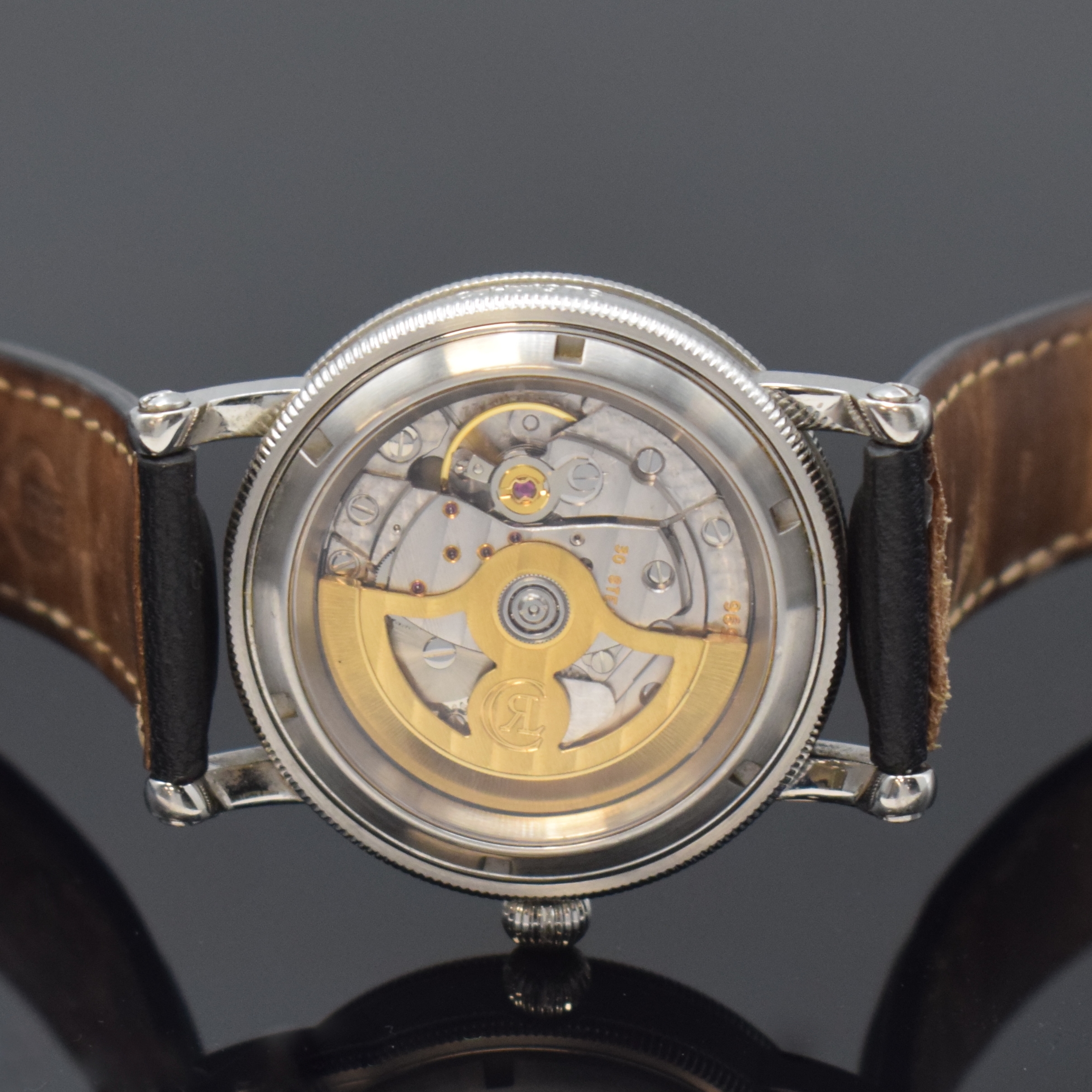 Detail g: CHRONOSWISS Regulateur Herrenarmbanduhr in Stahl Referenz CH 1223, Schweiz um 1995, Automatik, beids. vergl. Geh. m. Eigentümergravur, Boden ...