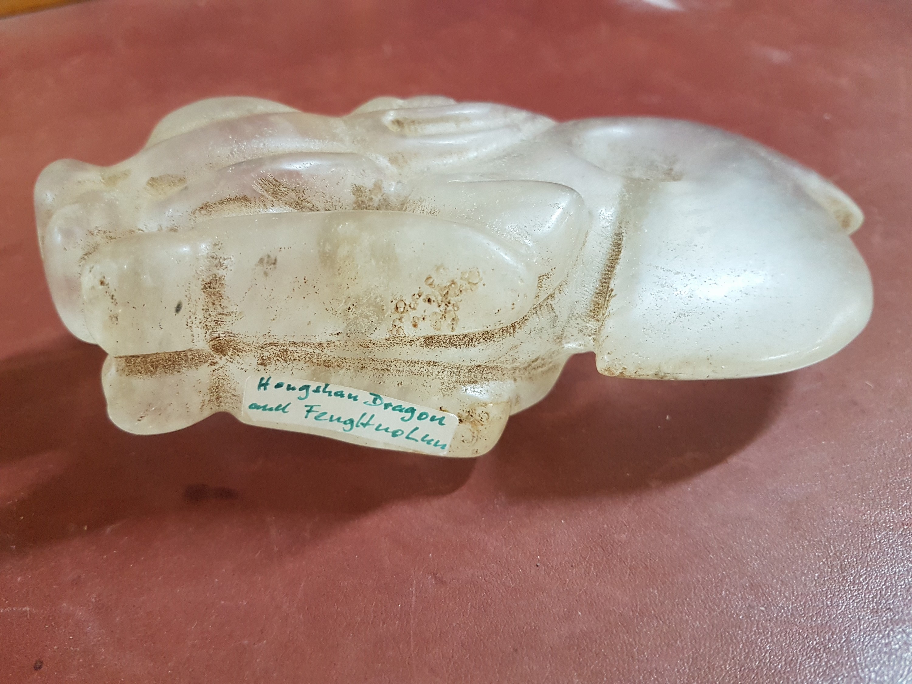 Detail e: Zwei Skulpturen, China, 20. Jh., a. Bergkristall ca. 9 x 14.5 cm, b. Jade, ca. 16.5cm, beide geschnitzt