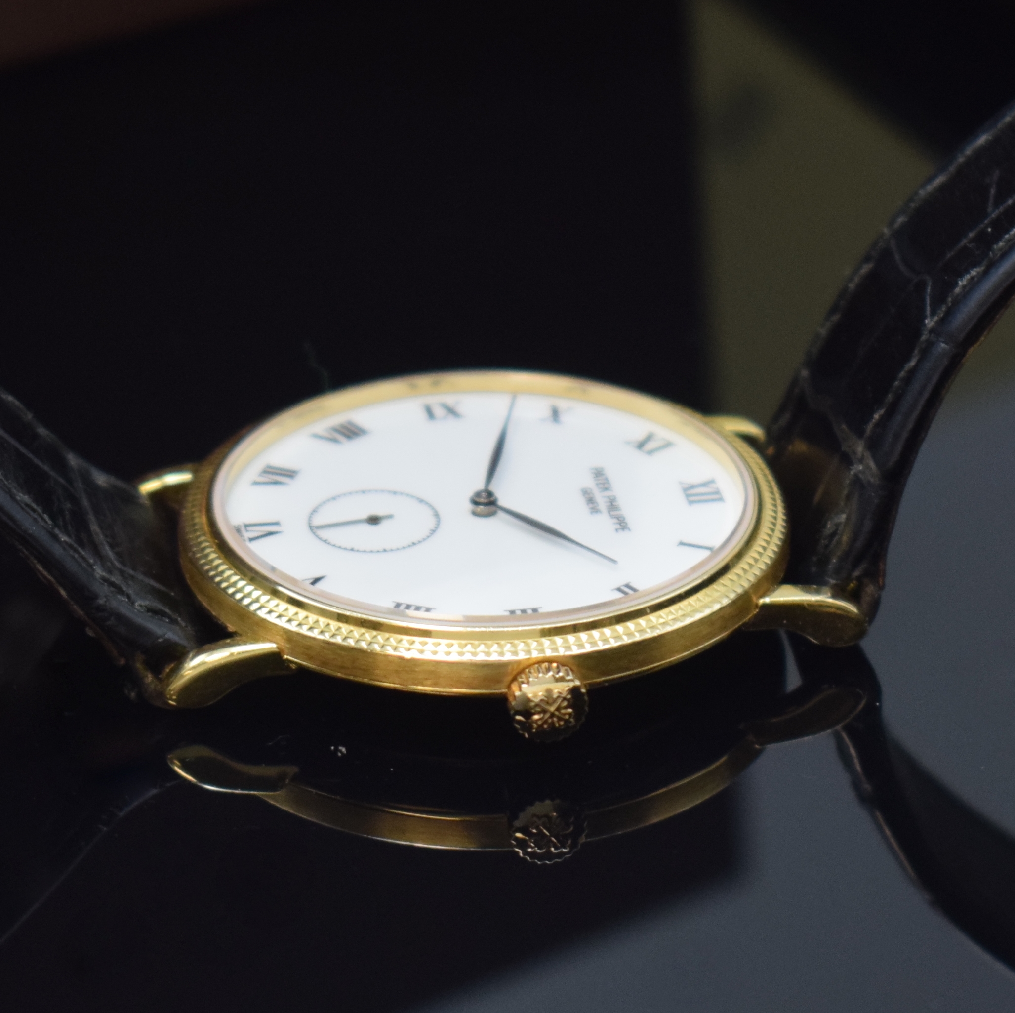 Detail c: PATEK PHILIPPE Calatrava Armbanduhr in GG 750/000 Referenz 3919, Handaufzug, Schweiz um 1990, 2-tlg. Geh. inkl. Lederband m. orig. Dornschl. in GG ...