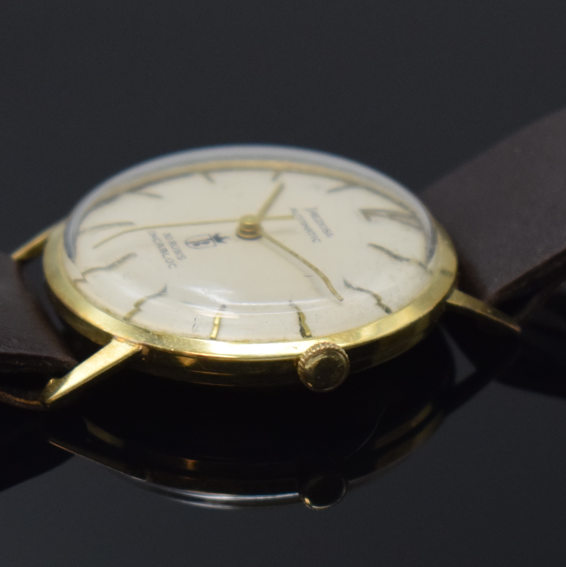 Detail b: PREZIOSA Armbanduhr in GG 585/000, Schweiz um 1965, Automatik, Boden aufgedr., silb. Zifferbl. teilw. fl., gold. Std.-Ind., gold. Zeiger, Kal. Felsa ...