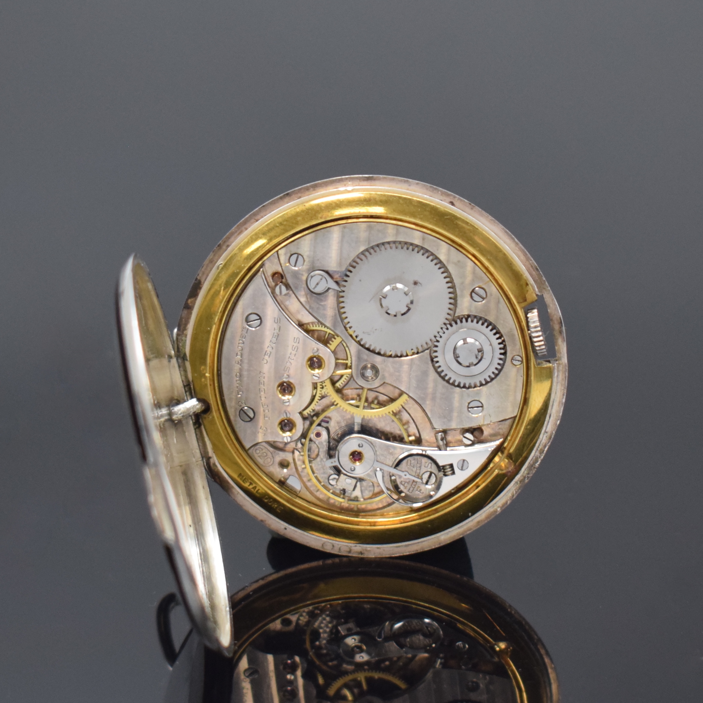 Detail c: MOVADO seltene Art-Deco Frackuhr in Silber, Schweiz um 1920, glattes Geh., Lünette u. Boden m. schwarzem Emailring besch., silb. Zifferbl., kl. Sek. ...