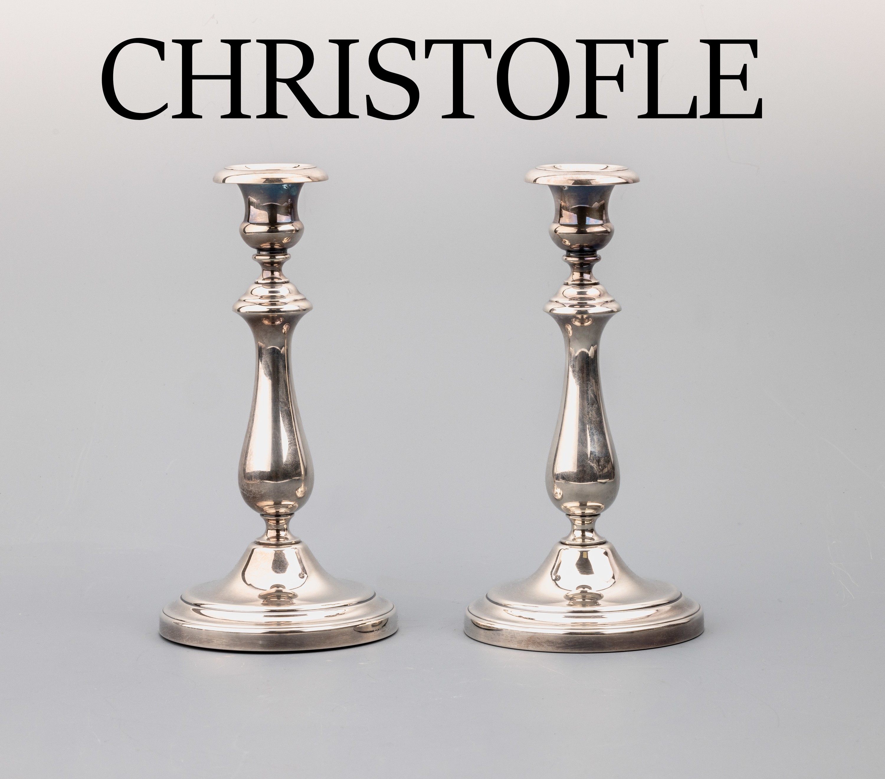 Paar Kerzenleuchter, CHRISTOFLE, Paris 19. Jh., Metall versilbert, klassische Form, H. ca. 22.5 cm