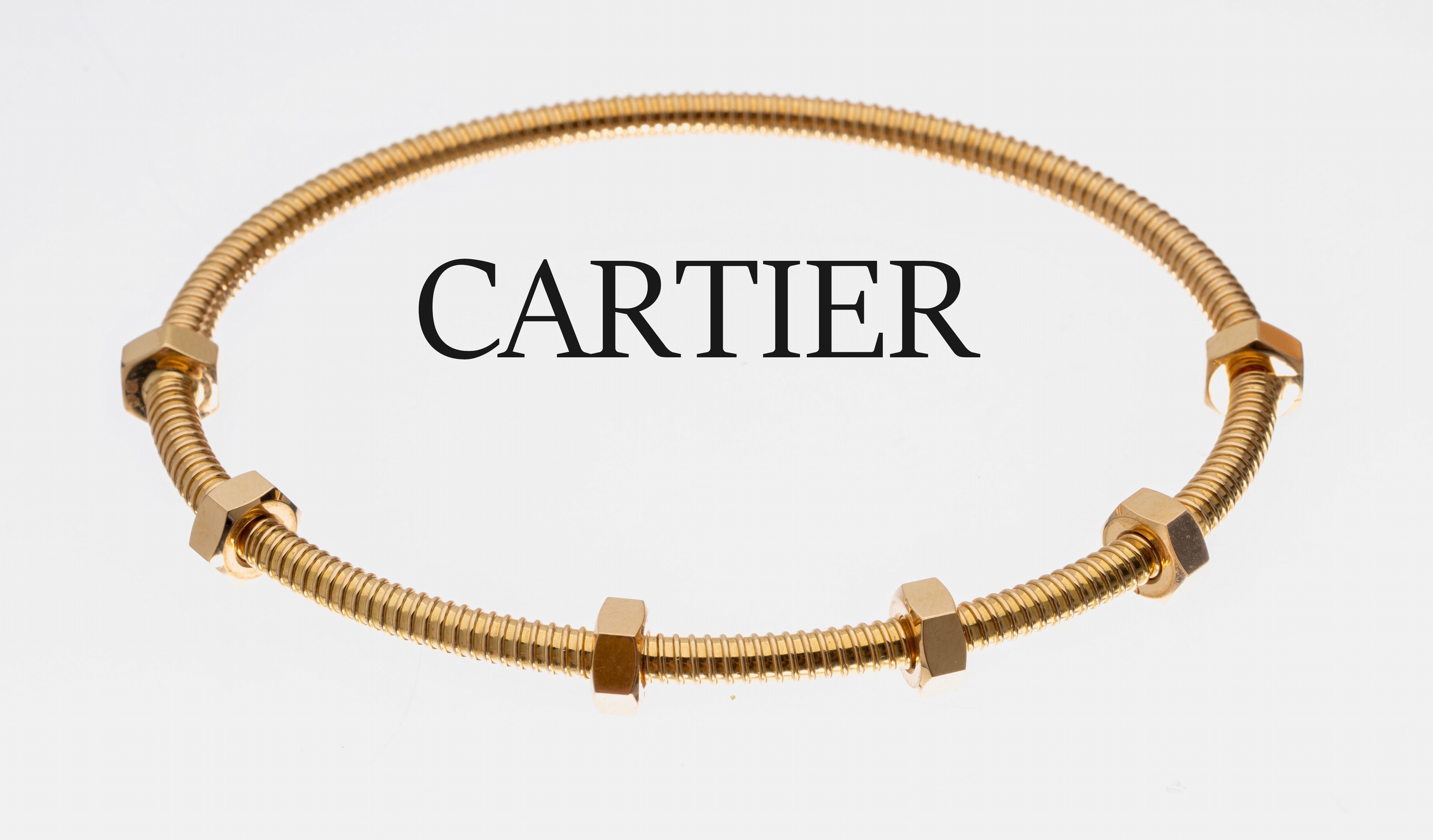 18 kt Gold CARTIER Armreif, GG 750/000, Model "Ecrou" D. ca. 7 x 5.5 cm (Größe 20), ca. 31.6 g, sign. und num., aktueller Neupreis: ...