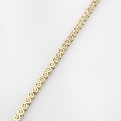 26875809a - Tennisarmband, GG 750/000, 42 Brillanten zus. ca. 1.40 ct Weiß/si, Kastenschl. m. ...