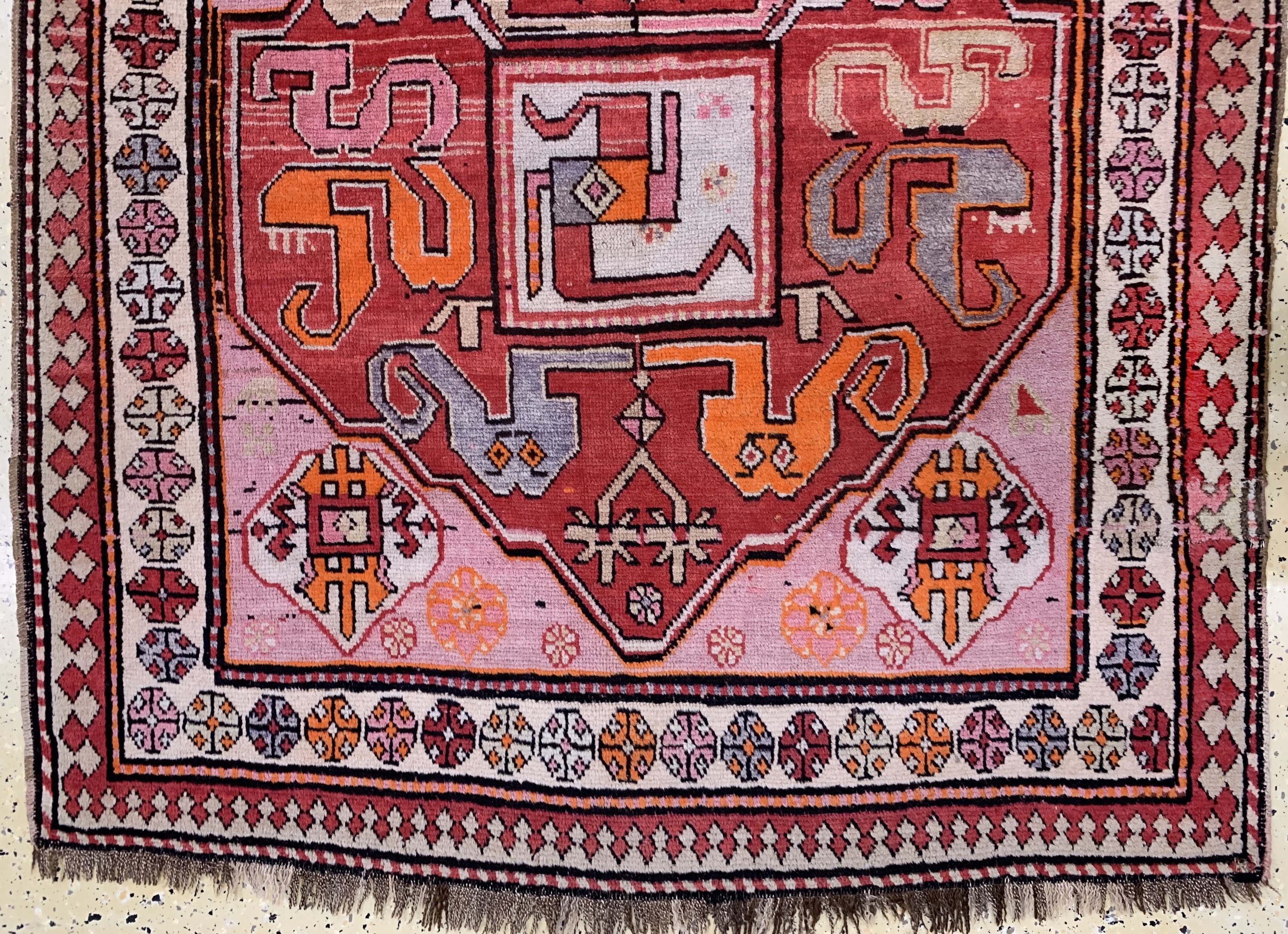 Detail b: Wolkenband Kazak, Kaukasus, Anfang 20.Jhd, Wolle auf Wolle, ca. 250 x 133 cm, EHZ: 2-3 (alte Restaurierungen)