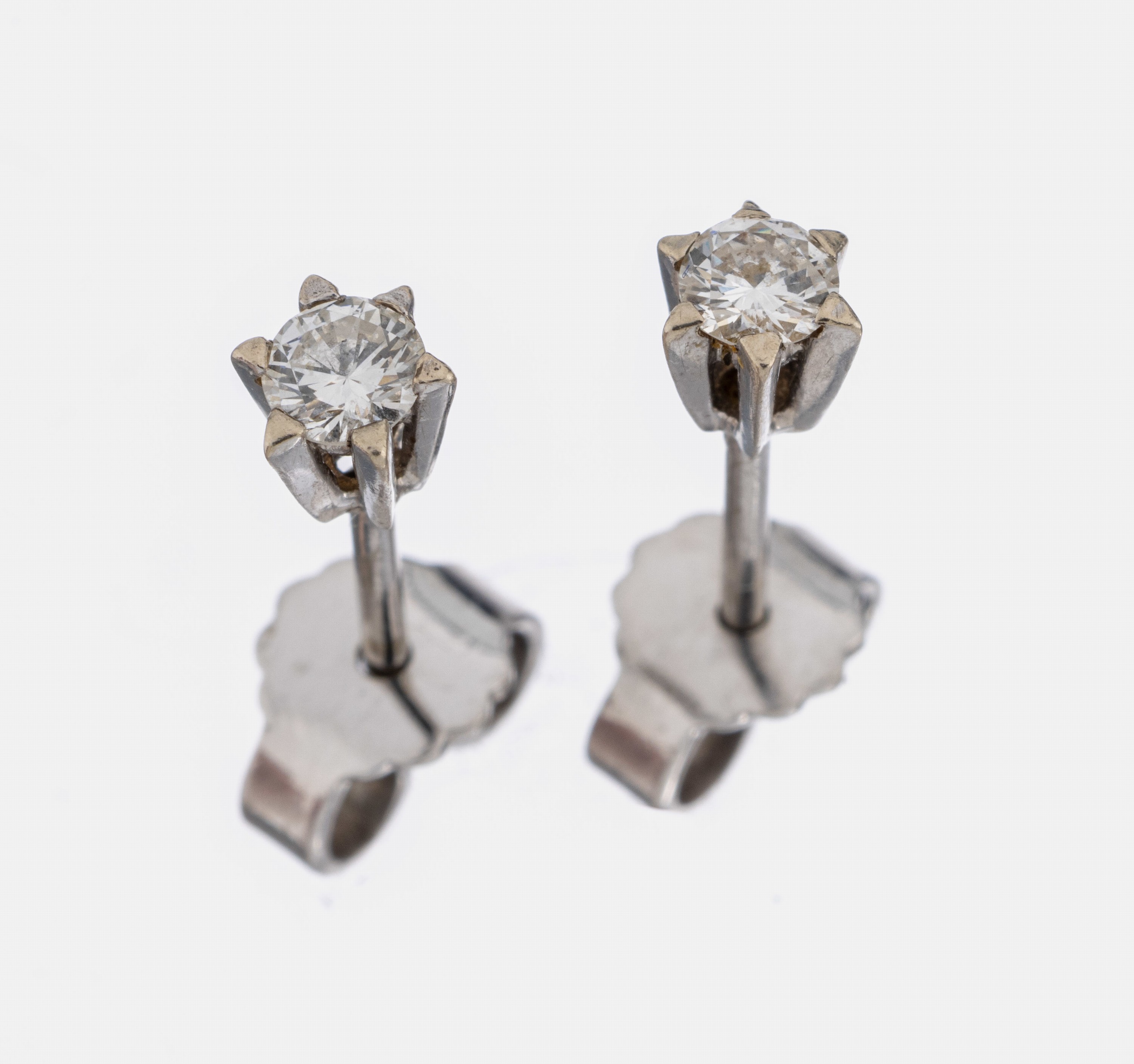 Paar 14 kt Gold Brillant-Ohrstecker, WG 585/000, 2 Brillanten zus. ca. 0.25 ct Weiß-l.get.Weiß/si