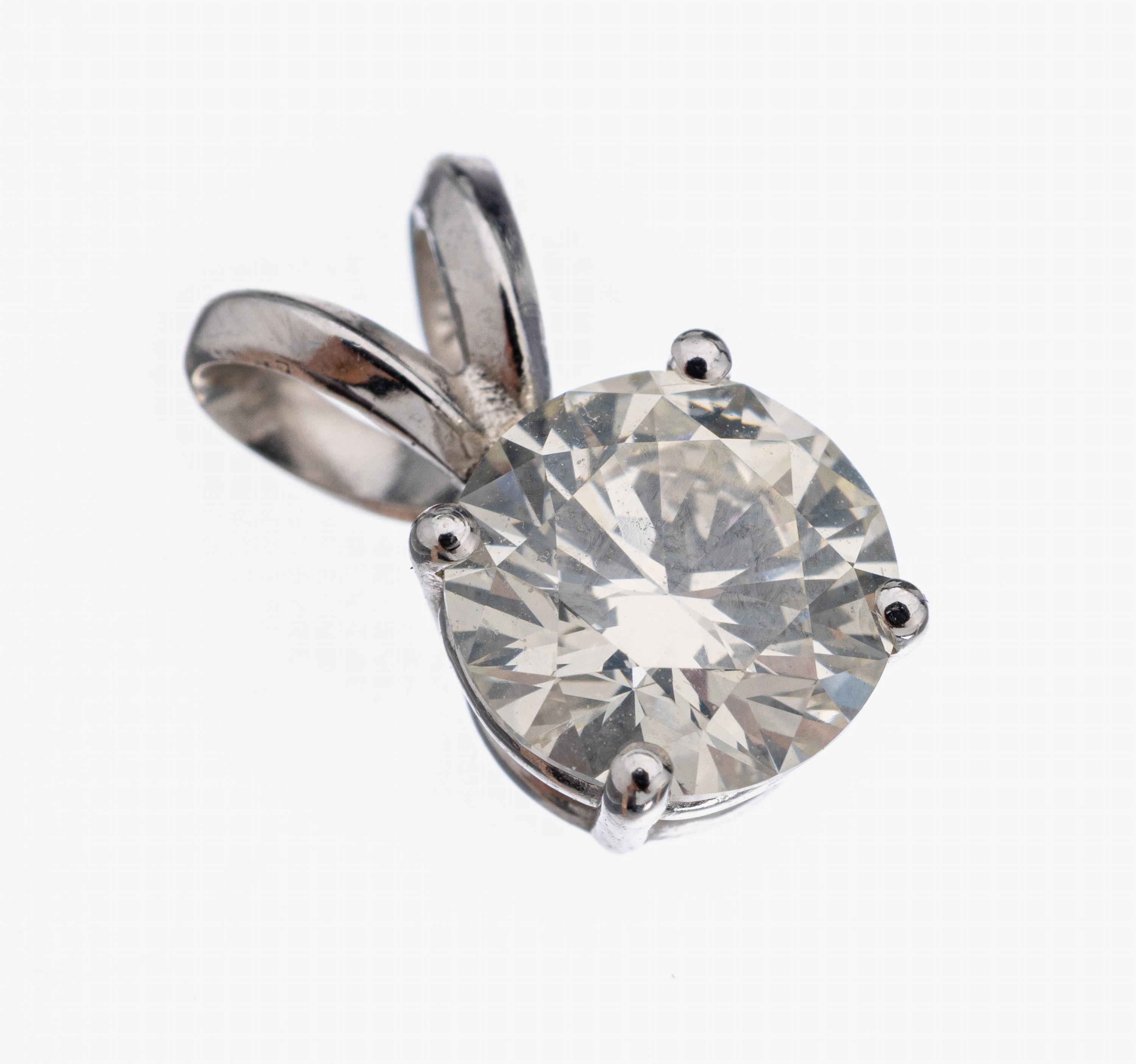 14 kt Gold Brillant-Anhänger, WG 585/000 gepr., Brillant ca. 0.90 ct Weiß-l.get.Weiß/si
