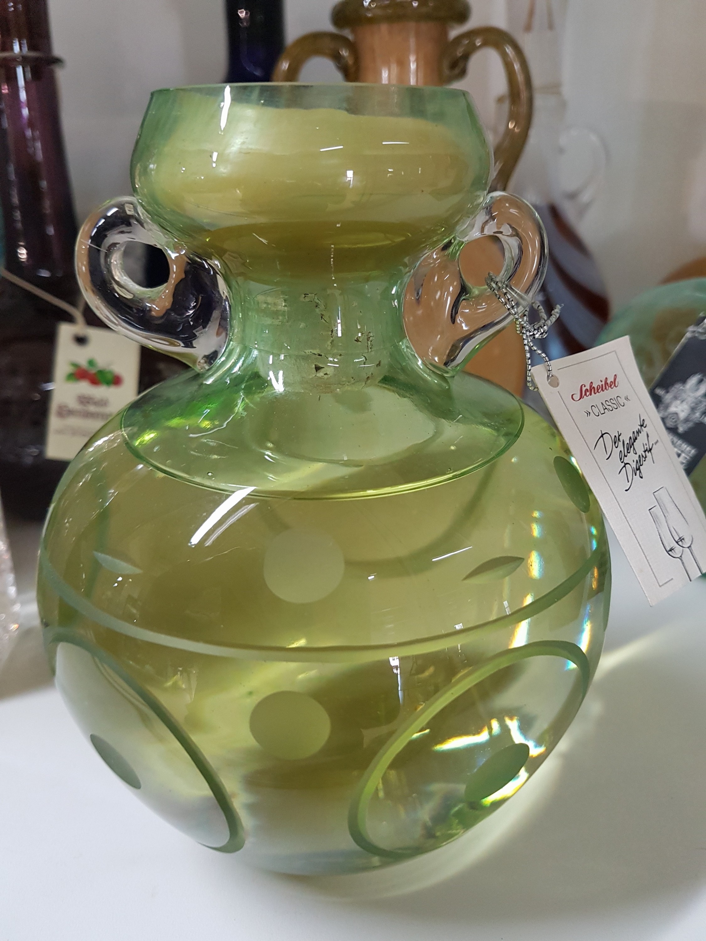 Detail d: Elf Jahresflaschen historische Weingefäße mit versch. Weinbränden, Daniel Kufner, Bayerischer Wald, 1999- 2011, römische Traubenflasche mit ...