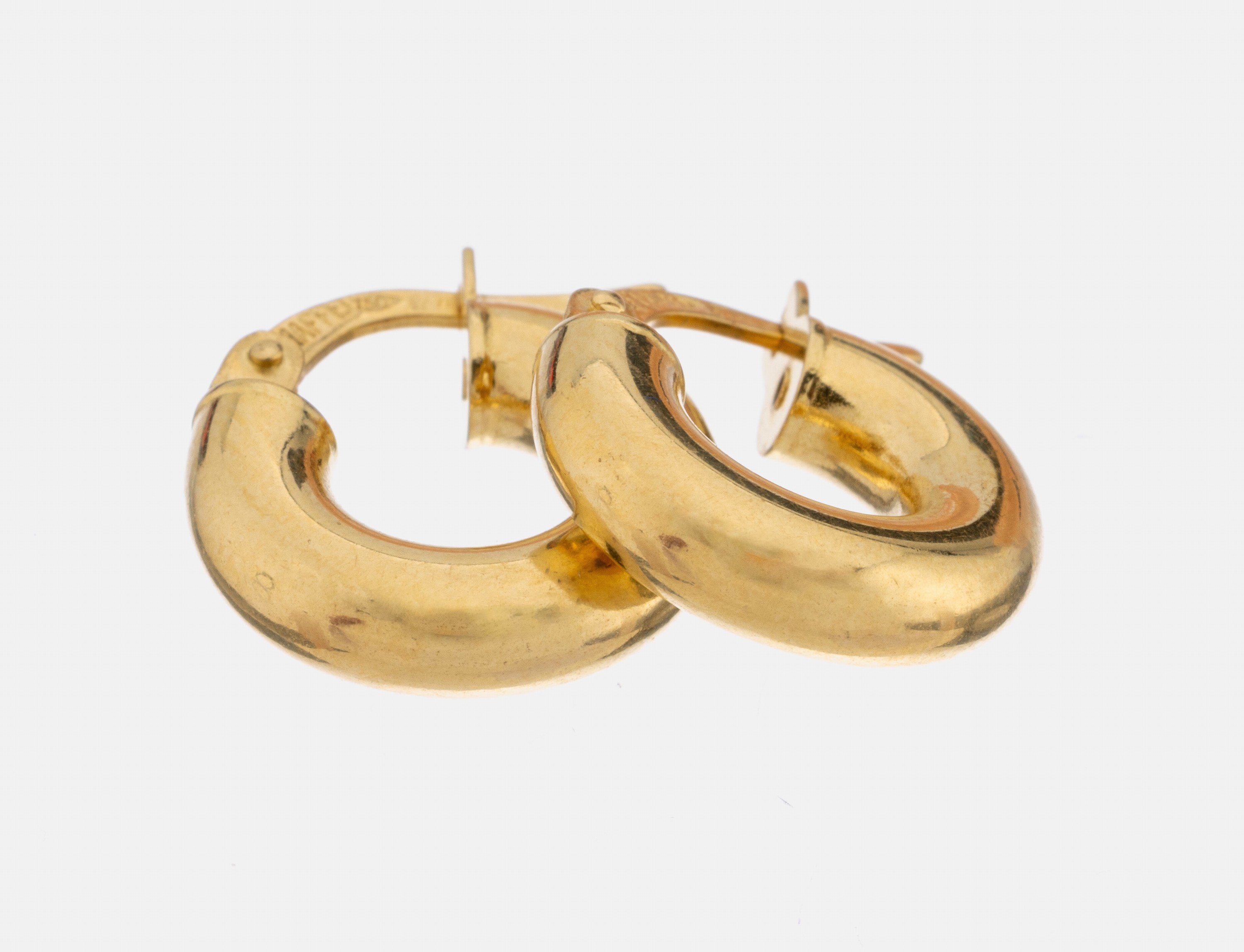 Paar 18 kt Gold Ohrcreolen, GG 750/000, schlicht, hohl gearbeitet, D. ca. 1.4 cm, ca. 1.8 g