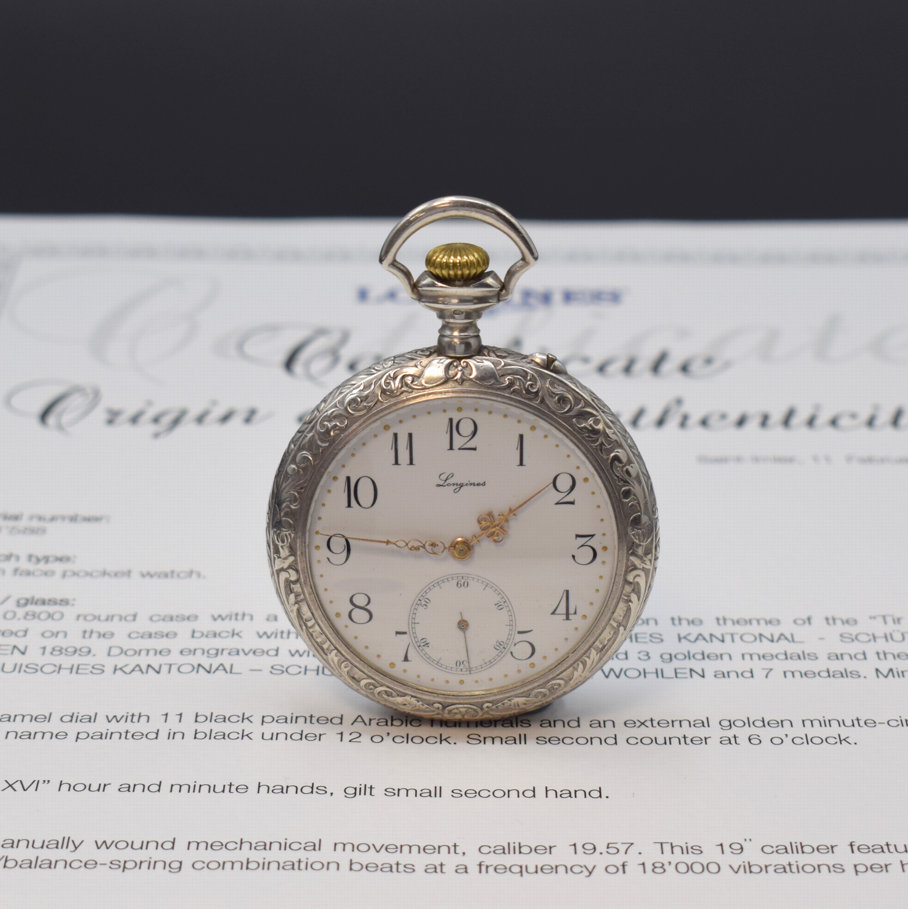 LONGINES Schützenuhr Wohlen 1899 in Silber mit Stammbuchauszug, Schweiz 1899, schweres Relief-Geh., rücks. Schützenmotive von Hughe Niners, ...