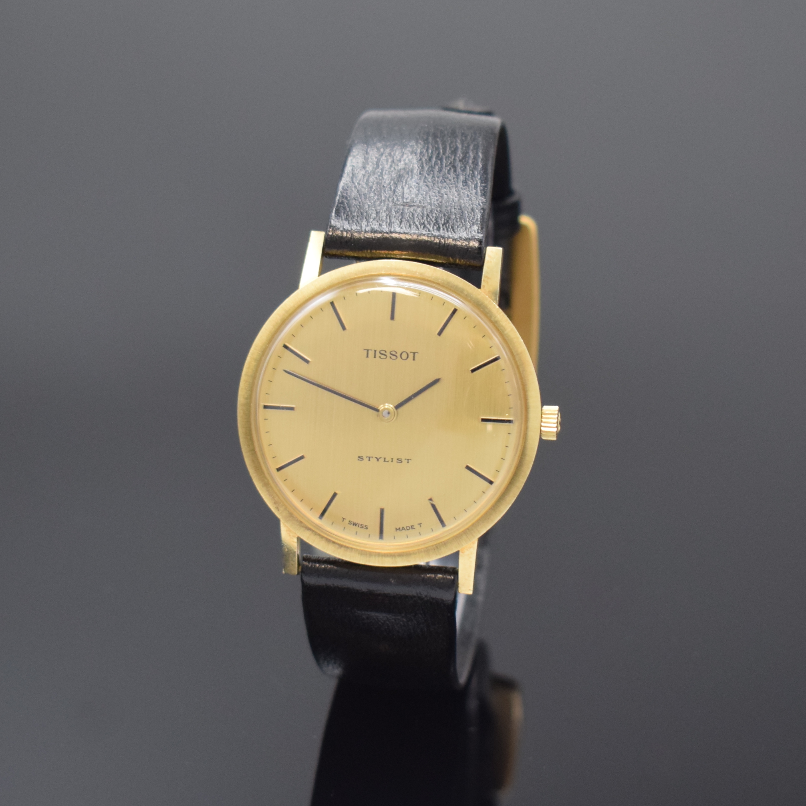 TISSOT Stylist nahezu neuwertige Armbanduhr in GG 585/000, Schweiz um 1970, Handaufzug, 2-tlg. Geh., Boden aufgedr., orig. Lederband m. verg. orig. ...