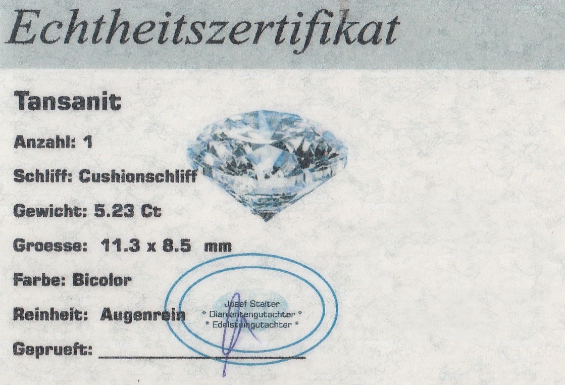 Detail c: Loser Tansanit, ca. 5.23 ct, facett. Kissen, Farbwechsel, 11.3 x 8.5 mm, mit Zertifikat