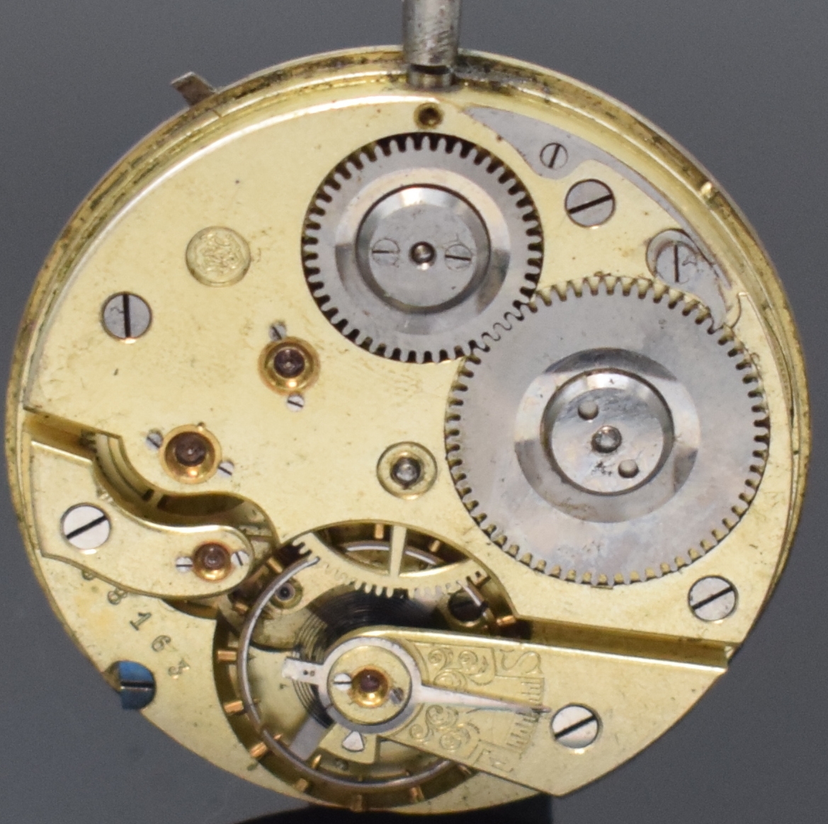 Detail a: IWC Taschenuhrwerk Kaliber 53, Schweiz um 1890, Emailzifferbl. riss., röm. Zahlen, gold. Zeiger, 3 verschr. Chatons, Komp.-Unr. m. gebl. ...