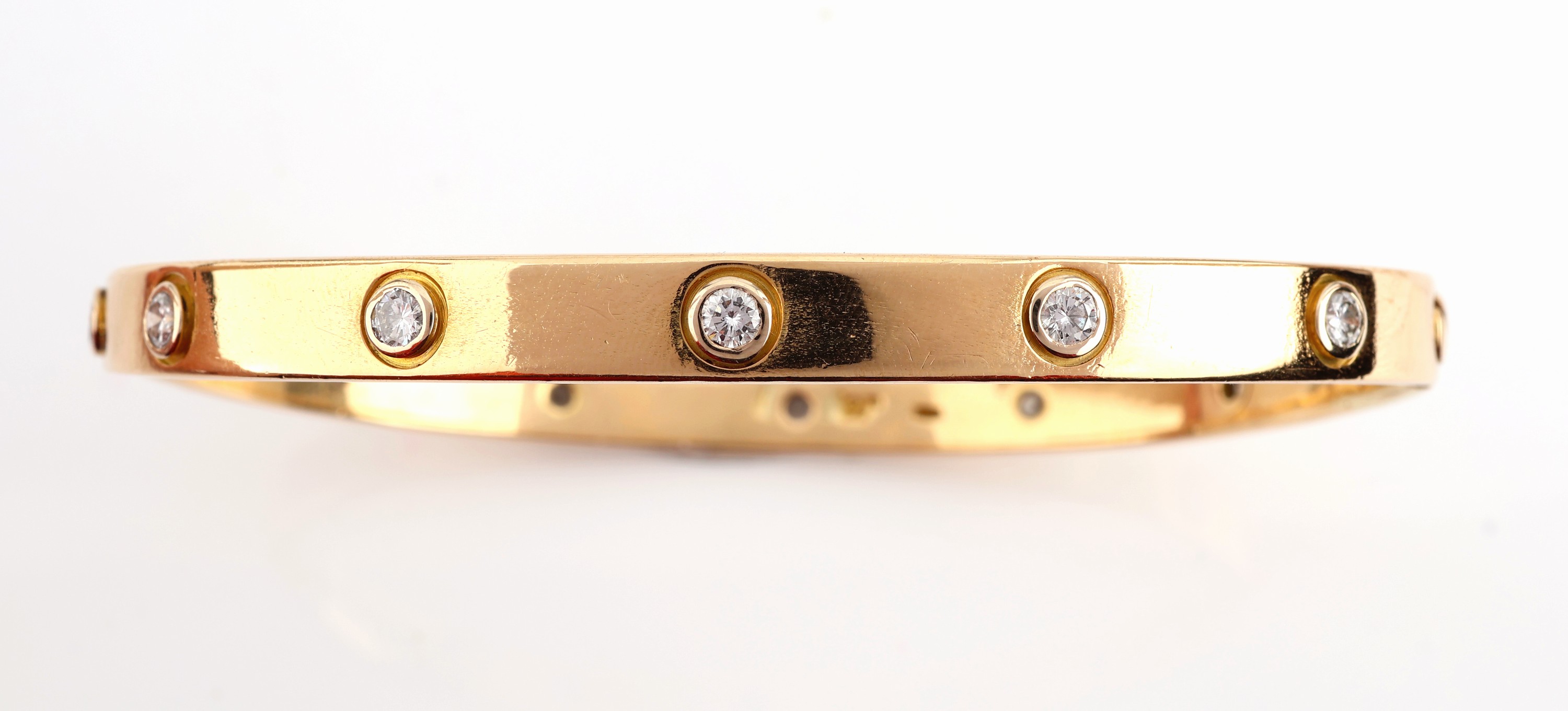 Detail a: 18 kt Gold CARTIER Brillant-Armreif "Love", GG 750/000, 12 Brillanten zus. ca. 1.20 ct Weiß/si, durch eine neutrale Weitenänderung ...