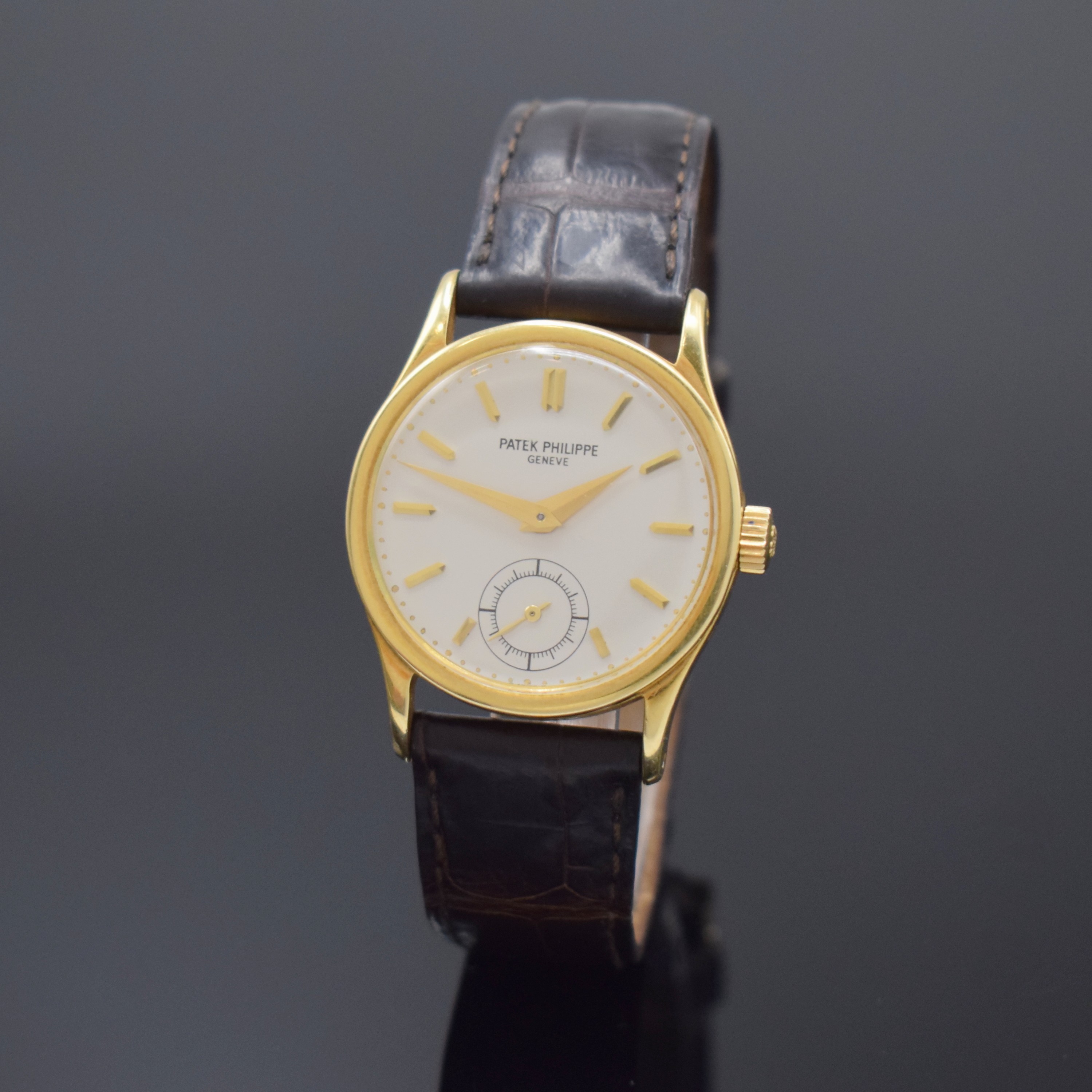 PATEK PHILIPPE feine und seltene Armbanduhr Calatrava Referenz 96, Schweiz um 1947, Handaufzug, 3 teil. GG 750/000 Geh. inkl. PPC Lederband m. PPC GG ...